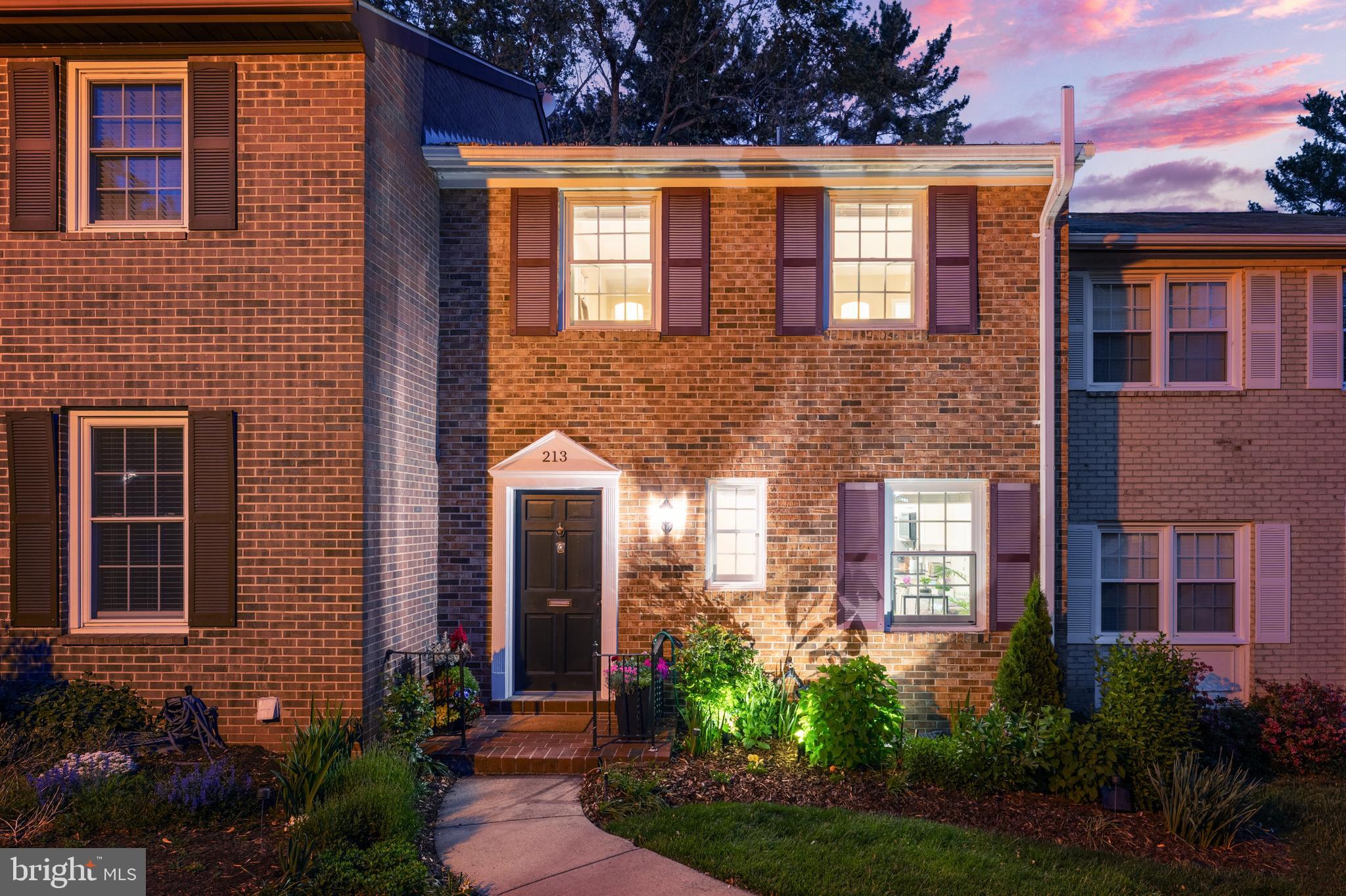Tucked into the quiet enclave of Vienna Commons, this all-brick three-level townhome brings together space, privacy, and the kind of walkable lifestyle people move to Vienna for. Inside, natural light pours through Andersen windows, highlighting the Hickory hardwood floors, refreshed kitchen and baths, and an easy, open flow across the main level. The eat-in kitchen opens into a spacious family room, while a formal dining area creates the perfect setup for hosting friends, holiday dinners, or laid-back weeknight takeout nights. Upstairs, the generous primary suite offers a private en suite bath and plenty of closet space, while two additional bedrooms and a full secondary bath provide flexibility for guests, a home office, or growing households. The walk-out lower level is oversized and versatile, with a huge rec room, abundant storage, and direct access to a beautifully manicured, fully fenced backyard with a TimberTech deck that backs to common green space and a tot lot—giving you privacy and room to unwind without staring into another row of homes. Located in the Madison school pyramid and just minutes to the Vienna Metro, this home also puts you close to everything that makes the Town of Vienna such a favorite: locally owned coffee shops, breweries, restaurants, farmers markets, parks, trails, community events, and Maple Avenue favorites all within easy reach. Vienna has a small-town feel with a social, connected energy that’s hard to find this close to DC, and this home places you right in the middle of it while still feeling tucked away from the pace of everyday life.