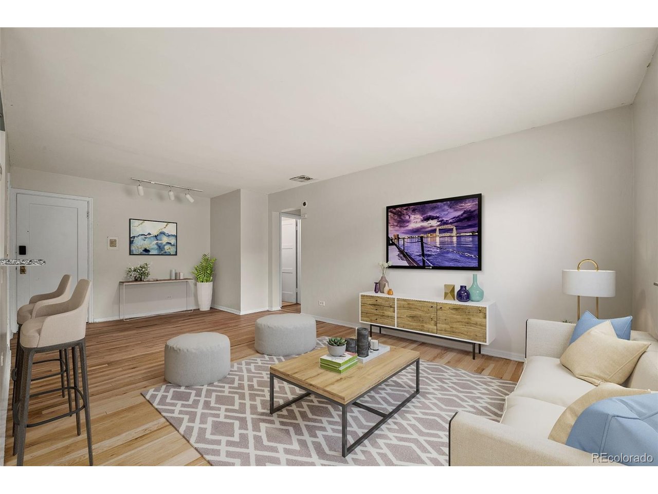 Welcome to Cherry Creek North! Experience the best ofcity living in this beautifully updated, top-floor condo filledwith natural light and charm. Nestled among mature treesand elegant custom homes, this bright and invitingresidence offers a perfect blend of comfort, style, andconvenience. Enjoy a recently renovated chef's kitchenfeaturing ample storage and generous counter space-ideal for preparing everyday meals or entertaining guests.The spacious open-concept living and dining area isbathed in southwest-facing sunlight, creating a warm andwelcoming atmosphere throughout the day!