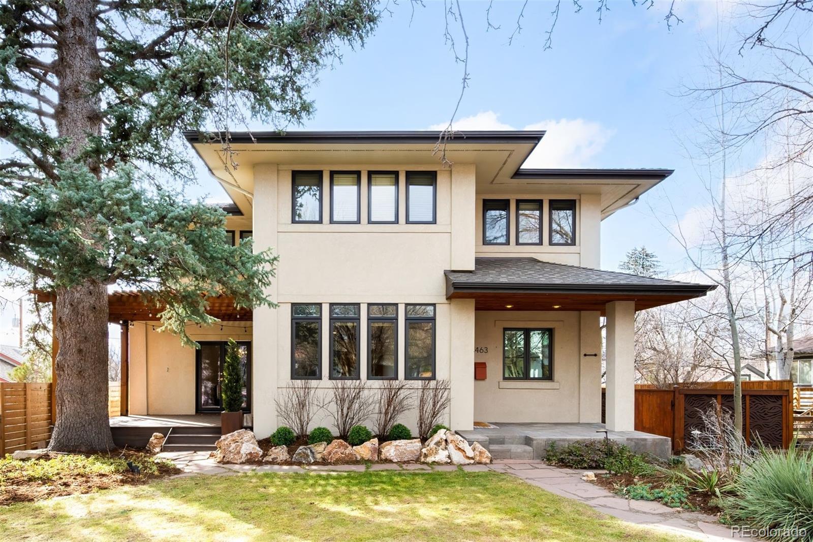 Set in coveted East Washington Park on an expansive 7,370 sq ft lot, this fully reimagined residence delivers the rare combination of thoughtful design, elevated finishes, and truly livable luxury. With over 4,300 finished square feet and a highly sought-after four bedrooms upstairs, the floorplan alone sets this home apart. The 2022 renovation was executed with intention and style, resulting in a showpiece kitchen that anchors the main level. Striking yet functional, the space features carefully curated materials, designer style, and a layout that beautifully supports everyday living and effortless entertaining. Throughout the home, you’ll notice bespoke details, purposeful upgrades, and smart architectural moments that reflect the sellers’ exceptional eye for design. Upstairs, four generously sized bedrooms are thoughtfully positioned on one level. The expansive primary suite offers a refined retreat, complete with a private west-facing deck with mountain views, a comfortable sitting area with double-sided fireplace, an oversized five-piece bath, and the convenience of laundry directly off the primary closet. The walkout basement is where this home truly becomes unforgettable. Rare for the area, the lower level opens seamlessly to the outdoors through a dramatic Cantina accordion door, creating an indoor–outdoor experience that feels modern and inviting. Designed to relax and entertain, this level features a custom TV built-in and a beautiful bar with luxury ice maker and beverage refrigerator. A secondary private entrance, flexible bonus space with Murphy bed, stunning bathroom, plus a gym and workshop space that completes the impressive basement. Outside, the generous yard offers exceptional usability with beautifully designed front and back outdoor spaces, new deck and brick paver patio, and charming tree house while still retaining plenty of room for pets and play. With newer mechanicals and over $500,000 of recent improvements this home is truly move-in ready