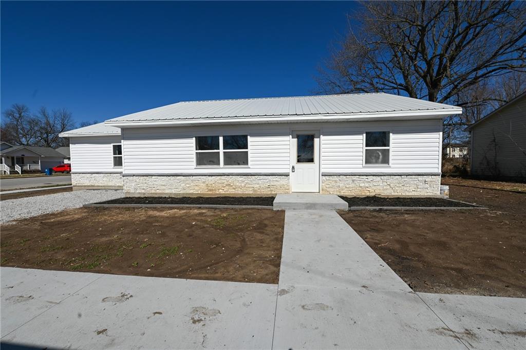 Home For Sale - Lamar, MO | Barton County  Construction completed 2/18/26.Discover quality and comfort in this thoughtfully built 3-bedroom, 2-bath home offering approx. 1,350 sq ft of well-designed living space. Constructed with Insulated Concrete Forms (ICF), this home provides unmatched strength, energy efficiency, and long-term durability. Why ICF Construction Matters: ICF walls consist of foam blocks filled with reinforced concrete, delivering superior insulation (R-30 walls), sound dampening, and resistance to fire, pests, and extreme weather. Foam forms remain in place, eliminating thermal breaks and reducing air infiltration — which means lower energy bills, less maintenance, and lasting value. Energy Efficiency Highlights: R-30 wall insulation: Exceptional thermal performance R-19 ceiling insulation: Reduces heat loss/gain These features ensure year-round comfort and cost savings, far beyond typical builds. Interior Features & Systems: Enjoy peace of mind with brand new appliances, including washer & dryer — all covered by a 7-year warranty. The 10×12 kitchen offers ample cabinetry and workspace for daily living and entertaining. Comfort is handled by a Rheem central HVAC system with a 10-year warranty, emphasizing quality and reliability. With three spacious bedrooms and two full baths, the layout supports a variety of lifestyles — from families to home office users. At ~1,350 sq ft, this home balances space and efficiency perfectly. This is more than just a house — it's a smart investment in modern living, built for long-term performance and comfort.