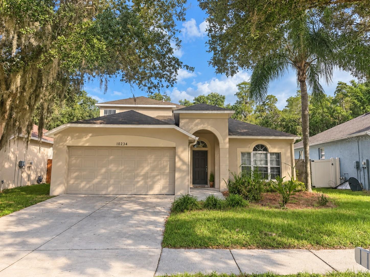 New photos coming soon. Seller offering up to $19,545 toward buyer closing costs, prepaid expenses, and/or an interest rate buydown. Conditions apply. Move-in ready 5-bedroom, 3-bath pool home in Tampa's established Cross Creek community with the big-ticket items already handled: new roof (2026), HVAC (2018), just serviced, and water heater (2021). A just-completed refresh adds fresh interior paint, new LED lighting and fixtures, and updated outlets and switches. The kitchen features new white shaker soft-close cabinets, White Ornamental granite countertops, a new faucet and garbage disposal, and new Whirlpool stainless steel appliances including a gas range, dishwasher and microwave. All three baths add new vanities with White Ornamental granite tops, new faucets and vanity lighting, with dual sinks and a new toilet in the primary bath. The two-story floor plan offers 2,368 SqFt with four bedrooms and two full baths on the first floor, including a primary suite with a walk-in closet, plus a fifth bedroom, a full bath and a loft upstairs. Luxury vinyl plank runs through the foyer, kitchen and primary bath, with tile in the living and dining areas and new carpet in all five bedrooms, the loft and stairs. An inside laundry room and an attached 2-car garage with a new opener round out the home. Out back, a sliding glass door opens to a screened pool and patio with a freshly coated deck, screen repairs, and a new pool filter and salt cell, plus refreshed landscaping with fresh mulch. $350 annual HOA plus a $225 annual community association fee, and no CDD. Conveniently located in New Tampa near shopping, dining and schools, with an easy commute to I-75. Buyer credit available with use of Seller's preferred lender. Schedule your showing today.