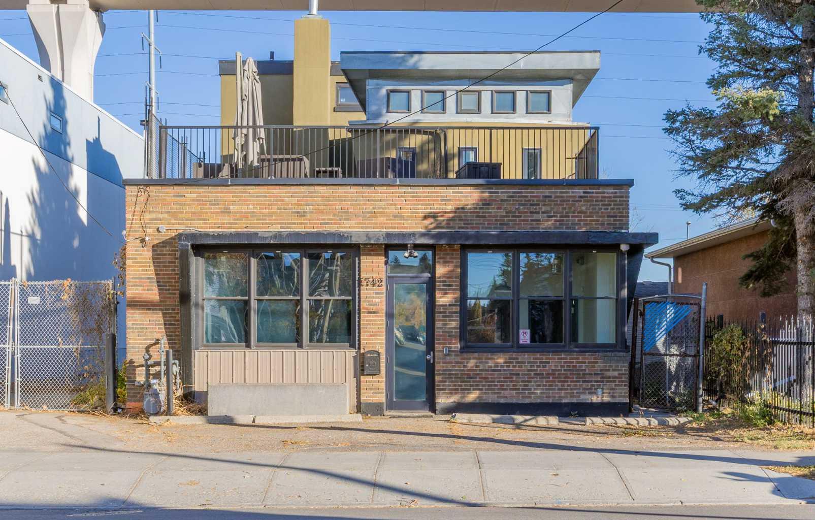 Discover a rare and highly versatile commercial asset just steps from the Sunalta Station (LRT) in one of Calgary’s emerging inner-city neighbourhoods. Zoned DC (Direct Control) and positioned on a 50' × 100' lot, this thoughtfully renovated two-storey building delivers approx. 2,228 sq ft of usable/rentable space — an excellent opportunity for investors, developers or owner-operators. On the main floor you’ll find a smart retail/office layout featuring an open plan workspace or client-facing area, a boardroom, a kitchenette, and two two-piece washrooms. The upper floor offers a large office space with its own 3-piece bathroom and a 863 sq ft private balcony — ideal for executive use or creative studio space. Outside, the site includes 3-5 surface parking stalls with convenient alley access, along with a generous storage footprint. With its DC zoning, this property is exceptionally flexible — perfect for mixed-use redevelopment, professional services, creative or wellness industries, owner-occupied rental income, or live/work configurations. Don’t lease when you can own in a central, transit-oriented location with strong upside.
