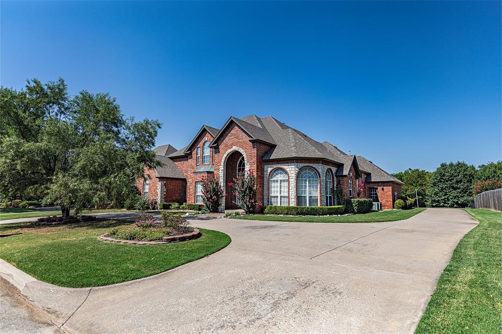 This stunning, freshly renovated home in the desirable Lakeridge Run neighborhood is tucked away near the end of a cul-de-sac on nearly 3/4 of an acre, offering plenty of space, privacy and a serene park-like setting with mature trees. The beautiful entrance features high ceilings and an eye-catching staircase. The interior includes 5 roomy bedrooms, 4 full bathrooms, an office, and a bonus media/game room upstairs. The open living area flows into both formal and casual dining spaces. The kitchen features stainless steel appliances, double ovens, granite countertops, and a walk-in pantry. The main-floor primary bedroom includes a spacious en-suite bathroom and an ample walk-in closet. A secondary bedroom and full bathroom are also on the first floor, while three more bedrooms and the bonus room are upstairs. New roof in 2020!  New interior paint throughout the home and new engineered wood flooring downstairs all completed in 2022. New dishwasher was installed in 2024, and a brand-new hot water tank was installed in 2023! This home also features two HVACs for optimal comfort. Just through the back doors, right off the formal dining area, the covered back patio provides a peaceful spot to enjoy the huge, partially fenced backyard. The driveway leads to the back of the home to a roomy 3-car garage, which includes an in-ground storm shelter for added safety, and also provides lots of space for storing additional vehicles or playing a game of basketball! With so much space, this home provides so many different options! And, being situated on almost 3/4 of an acre right in the heart of OKC, near many shopping & dining options AND within the Moore School district, this beauty is one of a kind! Schedule your private tour today and make this dream home yours!
