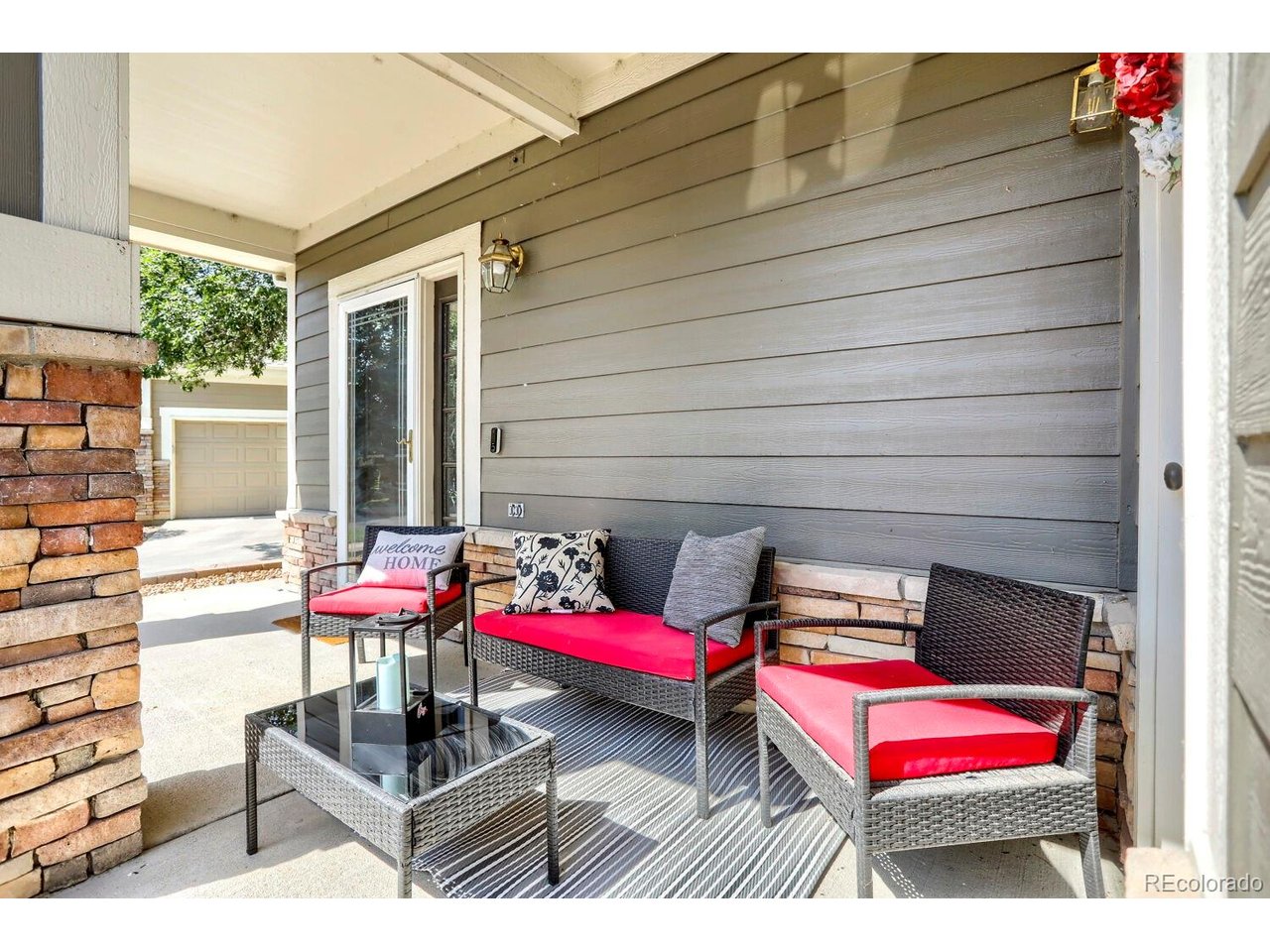Welcome to The Falls at Legend Trail! This fully renovated end unit ranch style condo in Broomfield is a must see. This home features an open bright living room, dining room, kitchen with plenty of cabinets, counter space and a pantry. Bright dining area off the kitchen, primary bedroom with an en-suite 5-piece bath with a spacious walk-in closet, an additional bedroom and full bath complete the interior space. Updates include but aren't limited to, a fully remodeled kitchen that includes new white stylish cabinets, granite countertops and Frigidaire stainless steel appliances, new flooring throughout unit; LPV flooring throughout home and new Karastan carpet in both bedrooms. Also features new interior paint throughout entire home, both the primary bathroom and main bathroom feature new vanities and countertops, flooring, new faucets and hardware, new lighting fixtures and window coverings. The furnace, A/C unit, and water heater replaced within the last few years, all electrical outlets have been updated and replaced. The washer/dryer sit in the large mud room that leads into the attached, oversized 2 car garage with epoxy floors. Outdoor relaxation is effortless with two outdoor patio spaces, including a welcoming covered front porch and a private patio off of the primary bedroom, perfect for enjoying your morning coffee while surrounded by mature trees and landscaping.  Community amenities including an outdoor pool, tennis courts, and a welcoming clubhouse. Ideally located in Broomfield, close to trails, parks, McKay Lake, the Broadlands Golf course, and shopping and dining. Easy access to Denver and Boulder. Come take a look!
