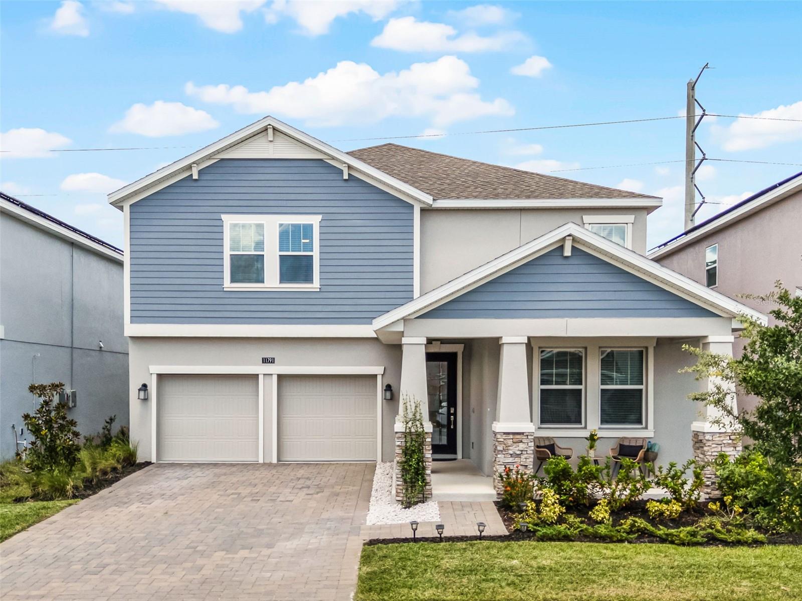 Welcome to this stunning 5-bedroom, 3-bathroom home in the highly sought-after Storey Park community. Offering a perfect balance of style, comfort, and functionality, this home provides the ideal setting for both everyday living and entertaining. Inside, you’re greeted with a spacious open floor plan designed for modern living. The heart of the home is the chef’s kitchen, featuring quartz countertops, stainless steel appliances, abundant cabinetry, and a large center island with seating—perfect for family gatherings and casual meals. The kitchen seamlessly flows into the dining and living areas, creating a bright, open space for entertaining or relaxing. The luxurious owner’s suite is a true retreat with its expansive layout, walk-in closet, and spa-inspired bathroom. Upstairs, you’ll also find three additional bedrooms, each filled with natural light and versatile enough to serve as guest rooms, home offices, or a personal gym. A dedicated laundry room upstairs adds convenience. The home also features a welcoming front den/office on the main floor, ideal for remote work or study. Step outside to a large backyard with a covered patio—perfect for barbecues, outdoor dining, or simply enjoying Florida’s sunshine in a private setting. Living in Storey Park means more than just a beautiful home—it’s a lifestyle. This vibrant community offers resort-style amenities including pools, fitness centers, playgrounds, and scenic walking trails. Plus, with easy access to major highways, Orlando International Airport, top-rated schools with a brand new elementary school being built inside the neighborhood and a brand new high school down the street, and premier dining and shopping, everything you need is right at your fingertips. This home is move-in ready and waiting for you to create lasting memories.