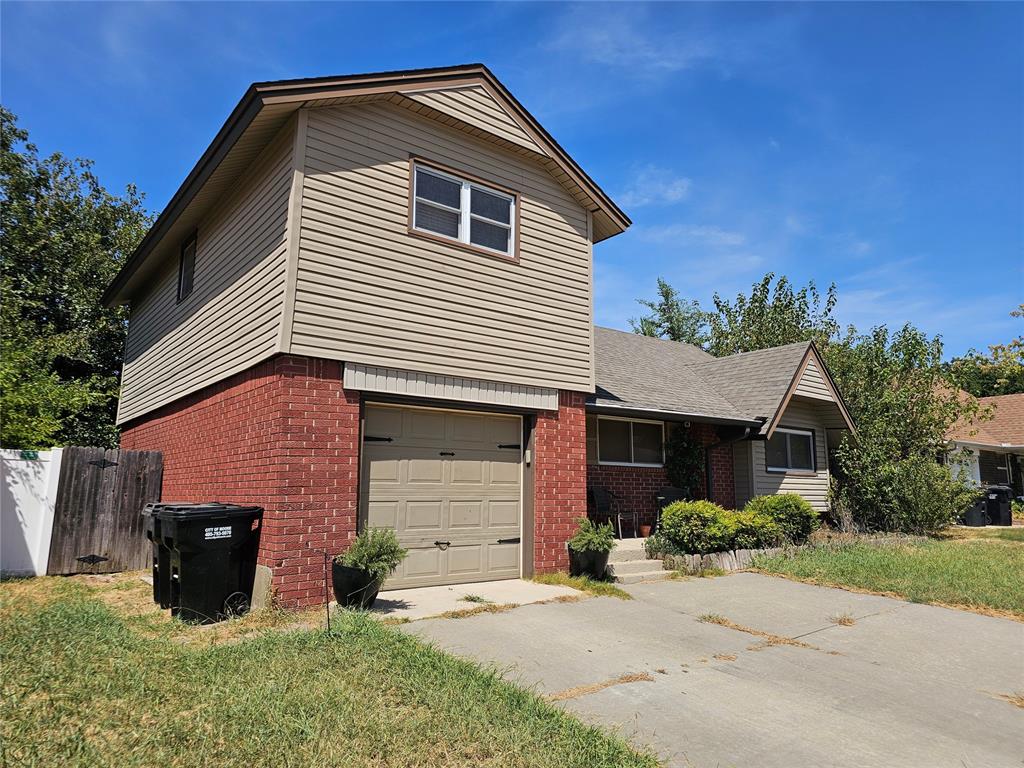 Remarkable 3 bedroom, 2 bath home just off 19th Street in Moore. Walking distance to Moore's Central Park, easy access to restaurants and shopping. This home offers large open living & dinning room with built-ins, window seat, laminate wood floors. Oak staircase leading up to the second floor offering 2 bedrooms and full bath. Kitchen with granite counters & glass tile back splash. Nice size utility room right off kitchen. Downstairs master with full bath. Large and private back yard with wood privacy fence, patio and storage shed/workshop, extra parking in the front. The garage has central heat and air. Don't miss out and schedule your showing today!