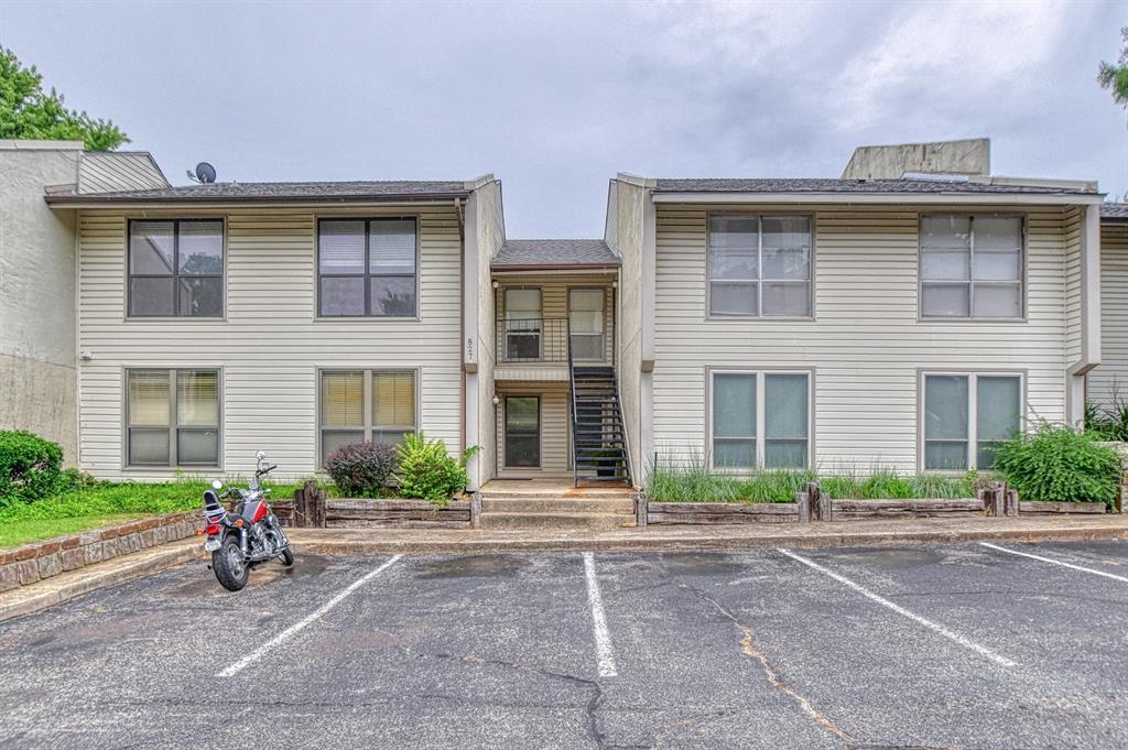 Come see this well maintained condo tucked away in wonderfully wooded and gated community near OU.  No carpet. Updated faux wood flooring. Tons of storage to include a pantry and large walk-in closet.  Newer gas stove. 
Bar seating as well as large dining area. Kitchen, dining, and living all open. Perfect location--backdoor leads to balcony.  Wonderful place to relax and enjoy the view. Two large bedrooms with large closets. Portable W/D is included. This heavily treed, gated community offers two routes to OU and is conveniently located off of HWY 9. Newer salt water pool steals the show. Club house and weight room also included. This unit won't last long.  HOA fees cover outside maintenance, gate, community pool and clubhouse, insurance, etc. Schedule your showing today and find this hidden gem!