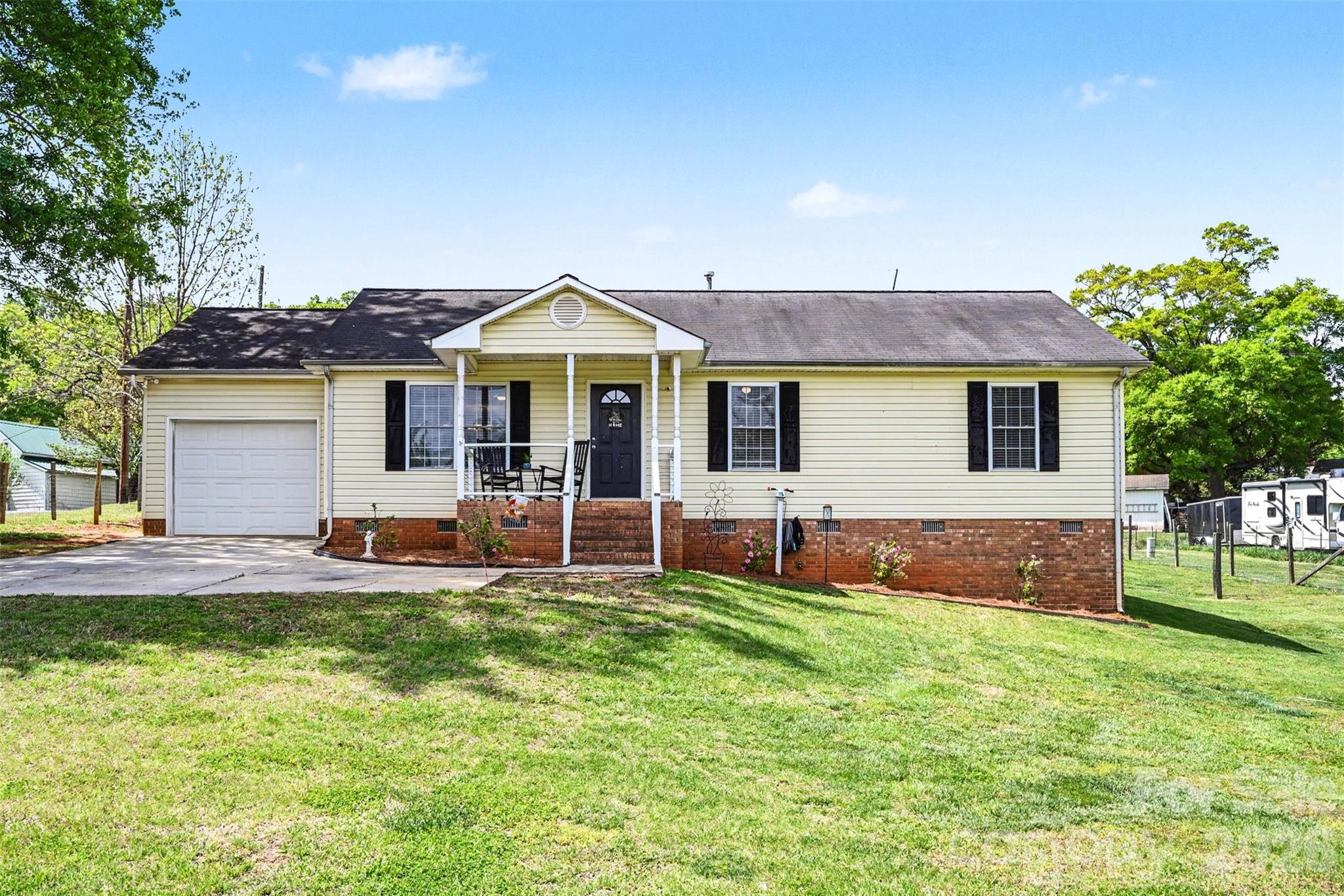 Welcome home to 353 Woodlawn Ave in Mount Holly. This move in ready 3-bedroom, 2 full bath home is just under 1300 square feet with a 1 car attached garage.Sitting on nearly half an acre, the fenced backyard gives you plenty of room to spread out, whether it’s for get togethers, or just having your own space.The location is what really makes this one stand out. You’re less than 5 minutes to downtown Mount Holly, under 15 minutes to downtown Belmont and the Whitewater Center, and about 15 minutes to the airport. You’re close to everything without sacrificing space.If you’ve been trying to find something in a good spot with a little land, this one is definitely worth checking out.