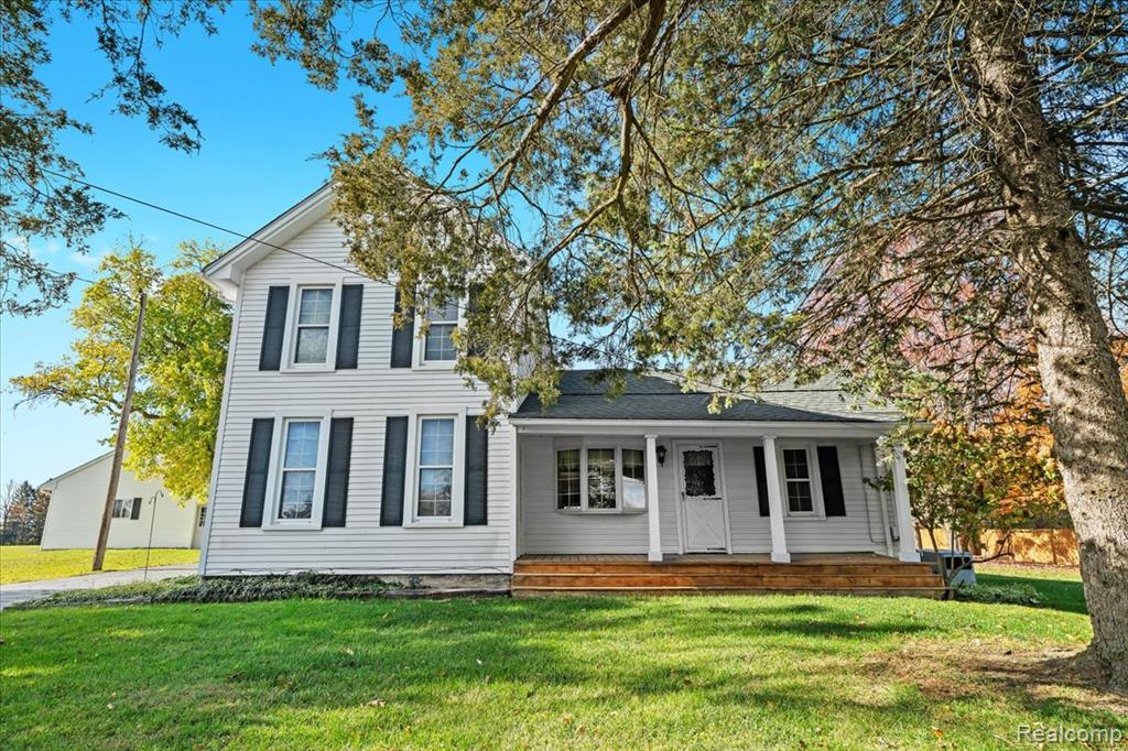 Welcome to 2795 N Burkhart Road in Howell. This 1920s farmhouse sits on just over 5.3 acres—with up to 10 additional acres available if desired—in the Howell School District. It blends timeless character with everyday practicality and offers a rare combination of city water, city sewer, and a paved road for a property with this much usable land and outbuilding space.The home features 3 bedrooms, 2 full baths, a primary suite, hardwood floors, maple kitchen cabinets, a whole-house generator, and a classic farmhouse front porch perfect for morning coffee.Outside, there’s room for every hobby: a 36x28 detached garage built in 2010, 64x30 barn, 48x32 insulated race car shop with 220 power, dual heaters, and two bays, water, plus a 40x24 horse barn with water and 3 stalls connected to a fenced pasture. Outbuildings include electric service, offering excellent workspace flexibility.Roof was re-shingled in 2018, Primary bath updated in 2016, Whole house generator, Wallside windows in 2006 & 2010 (35 yr transferable warranty)