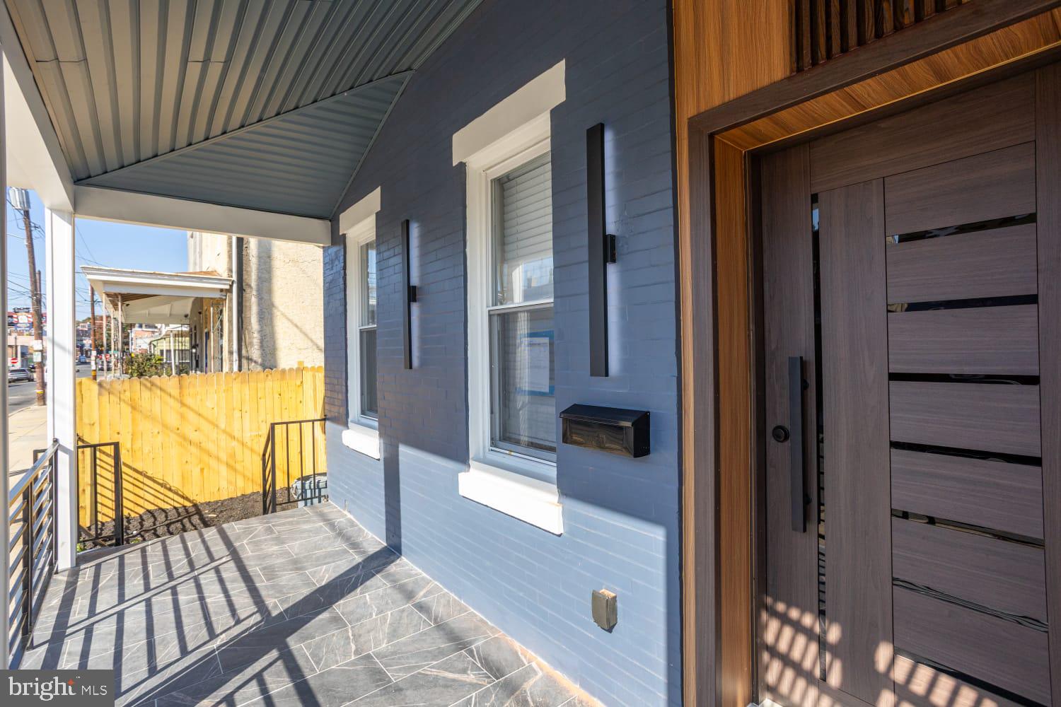 Nestled in the charming Frankford neighborhood, this exquisite twin home, built in 1925, seamlessly blends classic architecture with modern luxury. As you step inside, you are greeted by an inviting open floor plan that effortlessly connects the living, dining, and kitchen areas, creating a warm and welcoming atmosphere perfect for both relaxation and entertaining. The heart of the home features a beautifully upgraded kitchen, adorned with sleek stainless steel appliances, including an ENERGY STAR refrigerator, gas range, and a convenient microwave. The elegant countertops provide ample space for culinary creations, while recessed lighting casts a soft glow, enhancing the ambiance of this culinary haven. The combination dining and living area is perfect for hosting gatherings, with a cozy electric fireplace that adds a touch of warmth and sophistication. This residence boasts four spacious bedrooms, each designed to offer comfort and tranquility. The master suite is a true retreat, featuring a luxurious en-suite bathroom complete with a walk-in shower, ensuring a spa-like experience at home. With a total of three full bathrooms and an additional half bath, convenience is paramount for both residents and guests. The fully finished basement offers additional living space, ideal for a home office, media room, or play area, providing versatility to suit your lifestyle needs. The main floor laundry, equipped with front-loading washer and dryer, adds to the ease of daily living. Outside, the property is situated on a manageable lot, allowing for low-maintenance living while still providing a sense of community. On-street parking ensures convenience for you and your guests. This home is not just a place to live; it's a lifestyle choice that offers the perfect blend of comfort, elegance, and functionality. Experience the charm of Frankford, where local amenities and a vibrant community await. Embrace the opportunity to make this stunning residence your own, where every detail has been thoughtfully curated to create a haven of luxury and warmth.