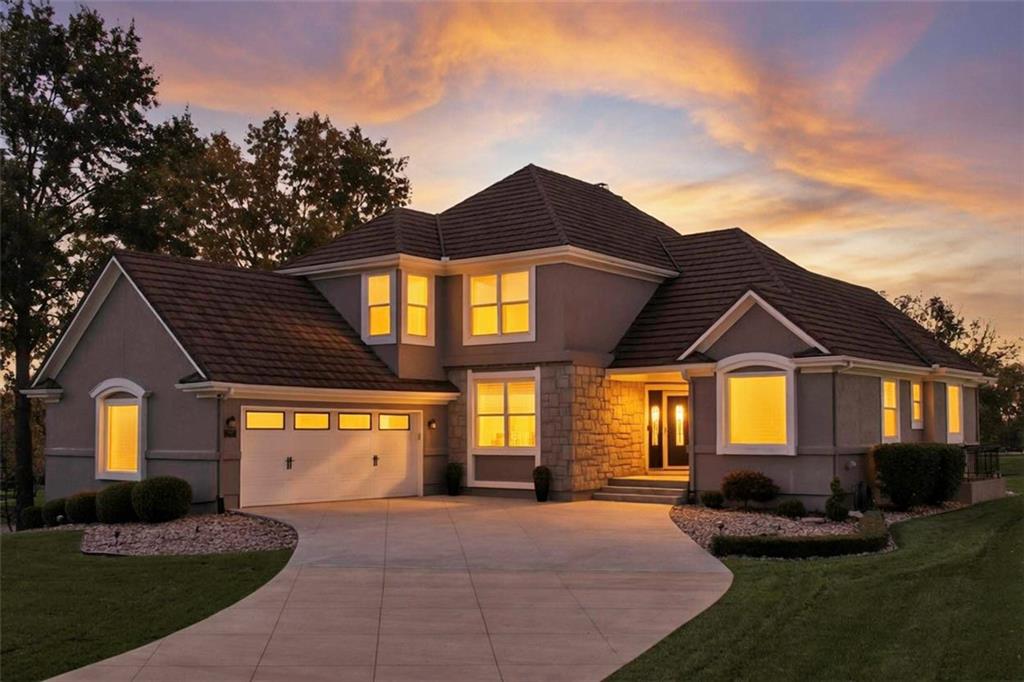 Offered at the lowest price per square foot in this prestigious community where homes sell up to over 10 Million! Put your own personal touch on the basement and have immediate equity! Don't wait to discover luxury living in the exclusive gated community of Loch Lloyd just in time for boating, pickleball, fishing and enjoying the lake all Summer long. Incredible amenities include a award-winning 18-hole golf course, brand-new neighborhood pool, state-of-the-art recreation center, fitness facility, and restaurant designed for the whole family. This 1.5 story is ready for its new Owner to enjoy! Open concept floorplan on a large lot with greenspace backing to deed restricted community walking trails! Seller has spared no expense updating the home inside and out and spent over 225K in updates including all major mechanicals, Kitchen remodel, Master bathroom remodel, fabulous covered outdoor space, new driveway with lifetime sealant, large living room, versatile office or dining room and more. Two bedrooms are located upstairs and a 4th bedroom with en-suite is located in the lower level with bar and living room. Check it out before its gone!