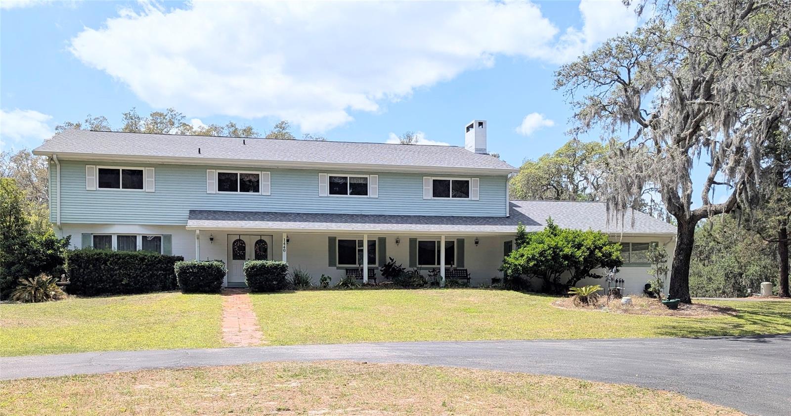 One or more photo(s) has been virtually staged. Stunning Home on 5 Private Acres – For your Dream Lifestyle. Welcome to this extraordinary property, where space, comfort, and versatility come together to create the perfect setting for both family living and business opportunity. Nestled on 5 sprawling acres of private, rolling landscape, this home offers a rare blend of tranquility and convenience, ideal for multigenerational living, a bed & breakfast, or even your very own personal retreat. Property Highlights are:
•  Generous Living Space – Large, bright open rooms that flow effortlessly throughout the home, offering ample space for family gatherings, cozy living area with fireplace, large kitchen and foyer areas and two master suites.
•  Generously-sized bedrooms, Jack & Jill baths,  and walk-in closets, pocket doors downstairs in the foyer, Large gamer room on the second story, this home is ready to accommodate extended family or guests, providing the privacy everyone needs while maintaining connection in shared spaces.
•  Bed & Breakfast Potential – Whether you want to create your own bed and breakfast or provide short-term rental spaces, the layout and surrounding land make it an ideal investment. Guests will enjoy the peaceful privacy, expansive wood deck and oversized pool while the property's size offers potential for expansion or unique amenities.
•  Detached Building on a 5452 SF concrete slab,  with Endless Potential –  equipped with electric and septic with plenty of room for your car collection, RV, or any toy storage. This versatile space can also be repurposed into anything you imagine, from an artist’s studio to an event space for your growing business
•  5 Private Acres – A park-like setting with rolling hills and scenic views, with expansive grounds for additional space for outdoor activities, gardening.
•  Ample Parking & Access – Easy access to all areas of the property, plenty of parking for guests, and room for additional vehicles, all within a peaceful, quiet setting. Additional features of this property include new roof, two a/c units, lots of storage, indoor laundry with rear staircase, pocket doors throughout, large game room and attached oversized, 3-car garage.
Fabulous location  just minutes from essential medical facilities, shopping centers, and Daytona & New Smyrna beaches makes  this home a standout. This property presents the perfect opportunity for those looking to create a one-of-a-kind family compound or income-generating bed and breakfast. With a perfect balance of private living, functional space, and future possibilities, this is an opportunity you won’t want to miss!