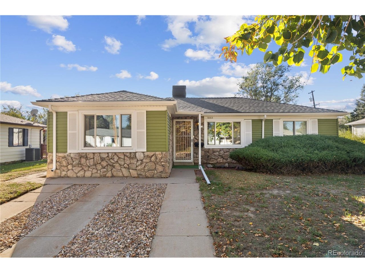Pristine original-owner home with a versatile layout and wonderful outdoor space. The main level offers a primary bedroom, two secondary bedrooms, a formal dining room, and a spacious family room with a striking stone fireplace. The kitchen opens to the covered patio, making it easy to enjoy the backyard and outdoor living.The finished basement adds a large recreation room, a non-conforming bedroom, a 3/4 bath, and a separate laundry room. Triple-pane windows provide added comfort, while a new roof and fresh exterior paint offer peace of mind. Outside, enjoy the beautiful yard with sprinkler system, plus an oversized two-car garage with workbenches and alley access. A 9.5-foot gate opens to a 9.5x15-foot trailer pad, providing extra space for parking or storage.If you've been waiting for a home with room to spread out, a comfortable main-level layout, and the chance to make a well-loved home your own, this could be the one!  Move right in, settle into the spaces that already work beautifully, and add your personal touch over time.Enjoy convenient access to neighborhood parks, recreation, and local destinations, including Fulton Park, Moorhead Recreation Center, Del Mar Park, and Stanley Marketplace.