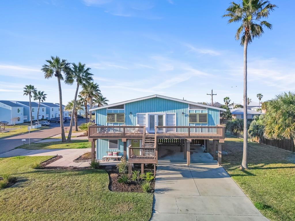 Key Allegro Bungalow | 3 Bedrooms |2 Bathrooms | Fully Furnished. This Key Allegro gem is waiting for you. A perfect spot for all your summer memories, and year-round fun. Find the ultimate attitude adjustment sitting out on either deck with loved ones. Enjoy fishing, downtown shopping, Rockport beach, or the many nearby bars and restaurants, all just moments away. One block from the Key Allegro marina and Community pool, you can even watch the 4TH of July fireworks display from the deck. Upstairs there is an open living room w vaulted ceiling, kitchen, dining, & two bedrooms and a full bath.  Downstairs, accessible through a separate entrance, you will find a guest suite, bathroom, & laundry/storage. There are two covered parking spaces, for cars & watercraft. An additional driveway for guests. Bring your suit & poles and you're set for a summer at the coast!