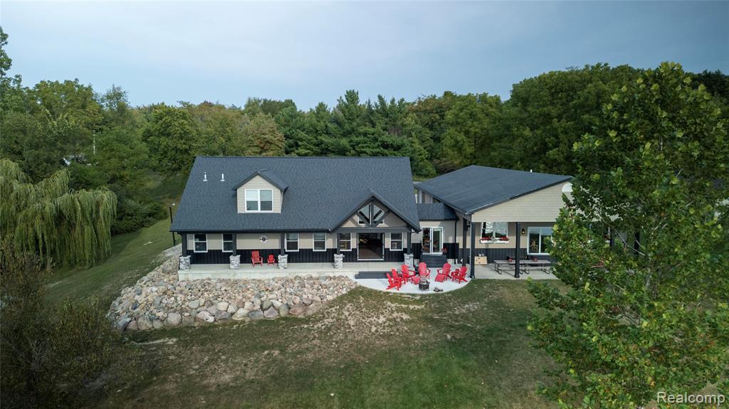 Stunning Lakefront Retreat on Lake Diane, 6 Bedrooms, 7 Acres, Trails & More! Welcome to your dream lake house on the beautiful all-sports Lake Diane, uniquely situated where Michigan, Ohio, and Indiana meet. This exceptional property offers the perfect blend of comfort, space, and outdoor adventure with 6 bedrooms, 3 full bathrooms, and over 7 acres of private, landscaped grounds. Step inside to discover an open-concept kitchen, a large family room, and a natural fireplace perfect for gathering with friends and family year-round. A spacious addition built in 2022 adds even more living and entertaining space. Enjoy the outdoors from your covered patio or take advantage of direct lakefront access with your own boat dock. The property also features a private trail system, ideal for hiking, exploring, and making the most of your acreage. Whether you’re seeking a peaceful retreat or a lively waterfront getaway, this home has it all room for everyone, modern amenities, and endless opportunities to enjoy lake living at its finest. Dock Included!