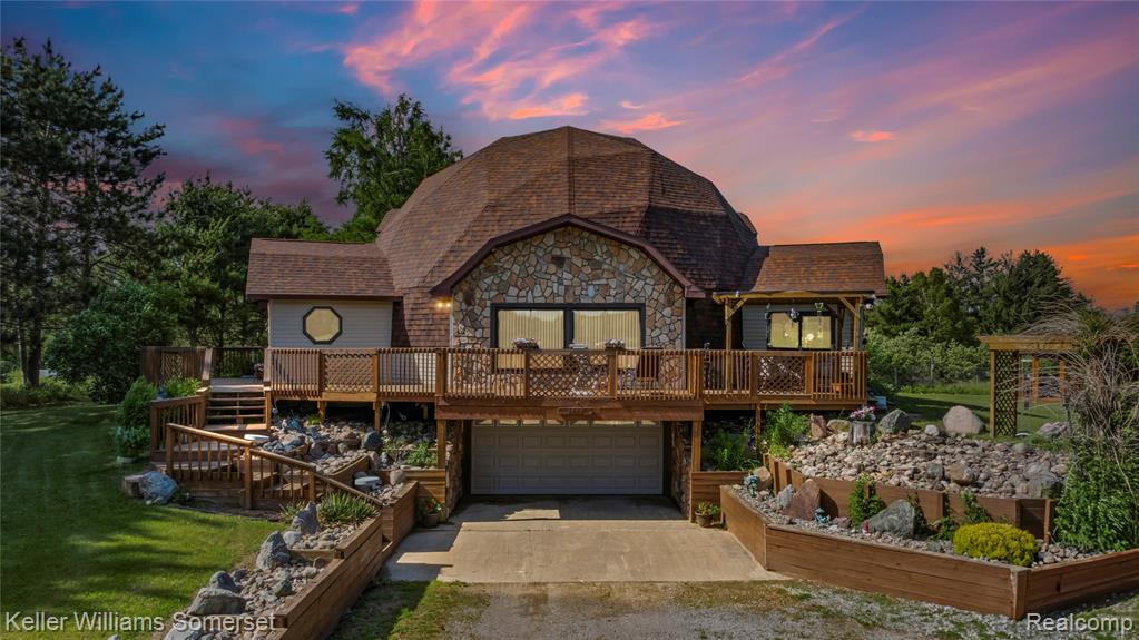 Truly one of a kind and custom built! Welcome to this charming 3-bedroom, 2-bathroom geodesic dome house nestled on 40 breathtaking acres in South Branch Twp. From the moment you arrive, the stone exterior and grand double door entrance into a spacious foyer set the tone for something special. Step inside to discover a warm and inviting interior with open lofts on both the second and third floors, offering a unique architectural flair and stunning views of the main level.
Designed for strength and durability, the dome’s triangular structure evenly distributes stress, allowing it to withstand heavy snow, wind, and even earthquakes. It’s also impressively energy efficient—the minimal surface area compared to volume means less energy is needed to heat and cool the home. Plus, natural air circulation and light distribution help reduce utility costs year-round.
The home includes a full basement with direct access from the attached two-car garage below—ideal for convenient entry, storage, workshop space, or future finishing. The kitchen and living areas flow effortlessly, highlighted by rustic charm and rich wood tones throughout.
Step outside onto the expansive wraparound deck—the perfect spot to sip coffee or unwind while taking in unmatched panoramic views of your private paradise. The property also includes a shed, a peaceful gazebo, and a barn—perfect for hobbies, storage, or outdoor entertaining.
Whether you're into hiking, hunting, or simply enjoying nature, this home offers space, serenity, and timeless design in one unforgettable package. Buyer and Buyer Agent to verify sq.ft and all other info.