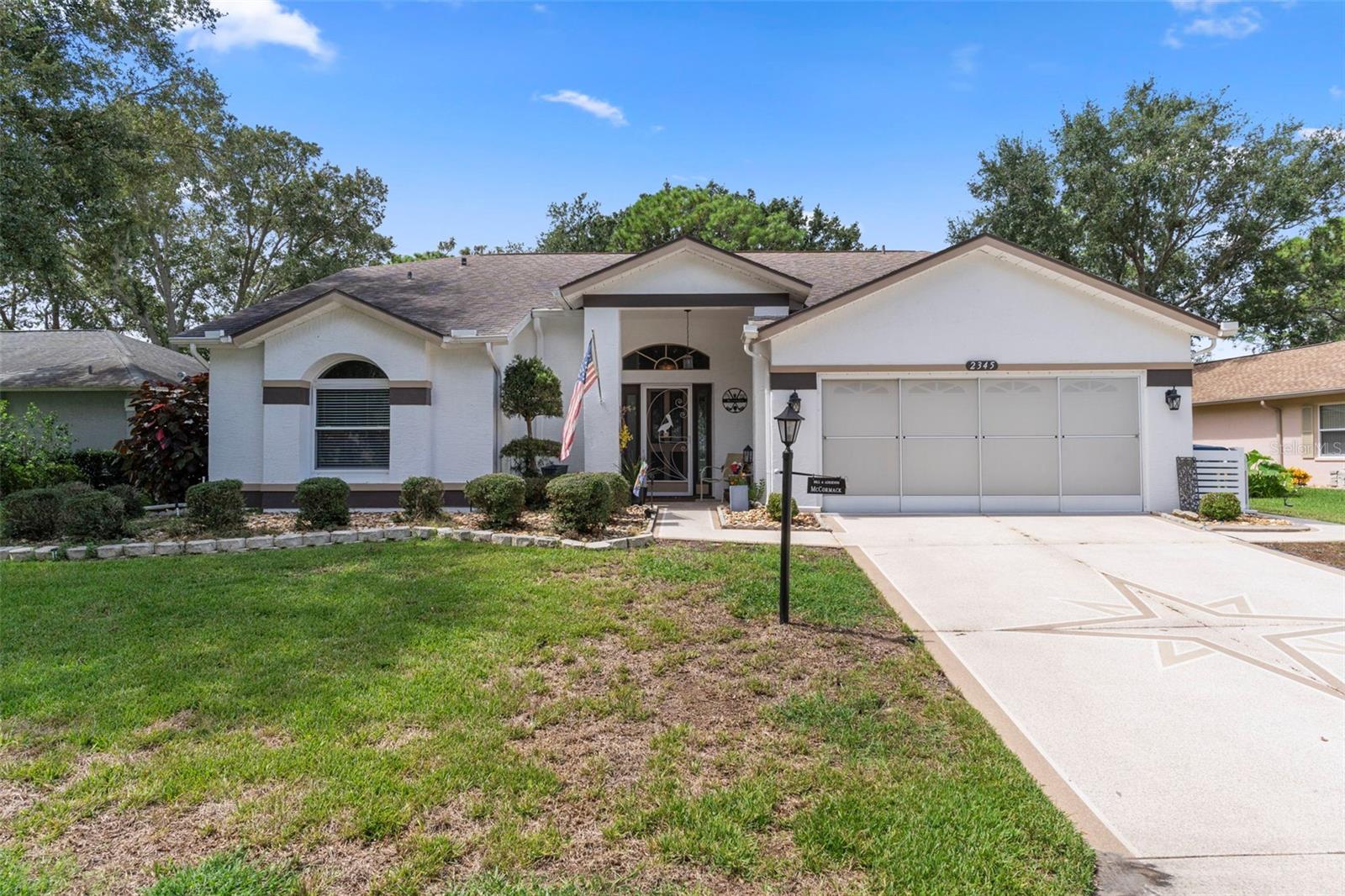 Welcome to this totally updated POOL HOME. SOLAR HEATED POOL WITH NEWER POOL PUMP. The open floor plan is so inviting to entertain guests and family. Upon entering the home through the etched lead lass font door you will notice the unique architectural flare of the arched entrance to the family room and the crown moldings. This home has character and shows pride of ownership.  Once inside the family room thee custom built wet bar will be sure to catch your eye. The updated kitchen offers tons of cabinets and granite counter tops with a new microwave. New matching luxury vinyl flooring throughout except for the bathrooms and kitchen, Beautiful newer hurricane impact windows and sliders modernize this home. Welcome out back to your large pool deck which is large enough for many pool parties in your oversize 12X34 pool that is 6.5ft deep. In addition the newer hot tub will convey with the home. The pool cage has been recently rescreened and  the home includes storm curtains to protect the lanai area. The home offers an inside laundry room with a 2 car garage that contains a club car golf cart included in the sale of the home. Attic fans and gutter guards were recently installed.  In addition the primary bathroom has a walk in shower with no step down. This home will be perfect for your Florida living.  In addition the home is located in the resort community of TIMBER PINES. Live in and enjoy this active and amazing community with 4 golf courses, 2 putting greens, a driving range, 2 pro--shops, tennis, pickleball, a multimillion dollar fitness center, 2 community pools and hot tubs, a full time restaurant, and a performing arts center. Numerous clubs and activities along with great entertainment throughout the year. Call today for a showing.