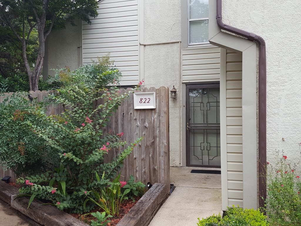 Check out this cozy loft condo right around the corner from OU Campus! This private, gated community features a pool, club house, and workout room. Perfect for entertaining with fireplace and half bath downstairs for guests, as well as bar stool seating in dining room. Kitchen features large pantry plus tract lighting and stainless steel oven. Master bedroom upstairs with full bath and large, walk-in closet. Built-ins in master bedroom and closet provide lots of storage space. Washer and dryer provided. Unit recently painted with newer blinds and light fixtures. Fridge, disposal and dishwasher also included. Newer granite in kitchen. Large pantry in kitchen for lots of storage. Take full advantage of newer community pool in summer and enjoy sitting on small patio during cool, fall months. This unit located on the corner for more privacy and is one to see! Close to restaurants, OU, Wal-Mart, Hwy 9 and Hwy 77. No smoking and no pets.