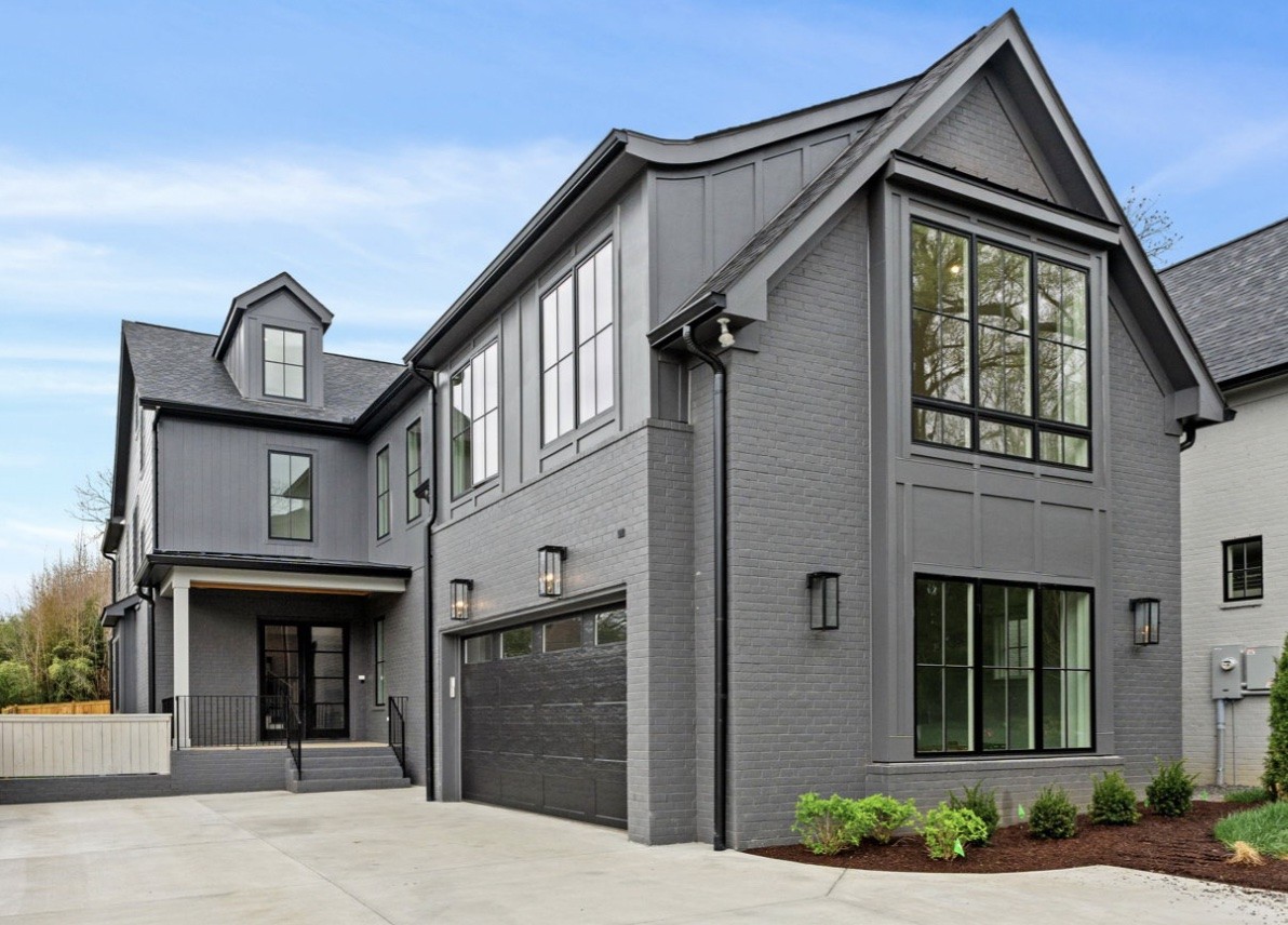 Tucked away on a quiet dead end street in Green Hills, this beautiful McKenzie Construction home offers the perfect mix of luxury and comfort. Just a short walk to Belmont Blvd, it's ideally located for both convenience and charm. The open layout is perfect for entertaining, with a stylish kitchen that flows into the dining and two dedicated living areas on the main. The main-level primary suite is a true retreat, with access to the back porch and a washer/dryer hookup in the closet. Upstairs, you'll find an additional primary en suite, four additional bedrooms (one easily accommodated as an office), a media/music room, and a bonus room with a wet bar. Plus, a small flex room for hobbies or exercise. Enjoy the outdoor space with a cozy fireplace, ideal for relaxing or hosting friends. There is room for a small pool! This home has it all—comfort, style, and location!