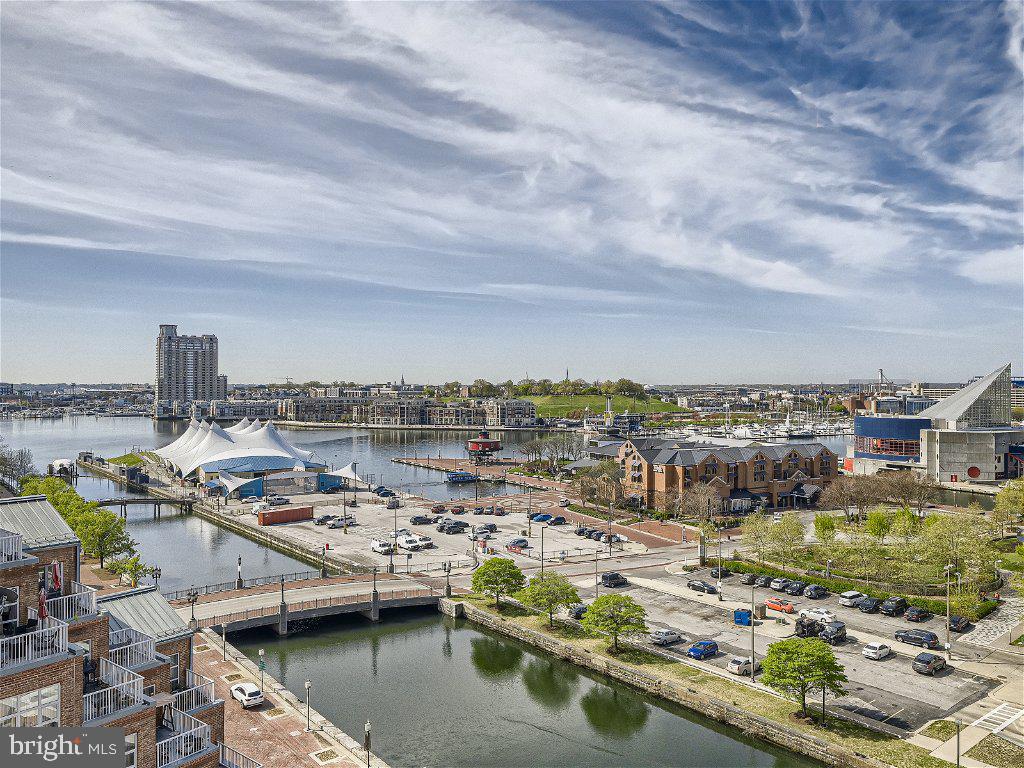 Enjoy this wonderful waterfront location, your own deck to watch the harbor activity and yet only footsteps away to enjoy all that is happening in the area.  2 large bedrooms and wonderful upgrades thru the entire unit.  Call today to see.