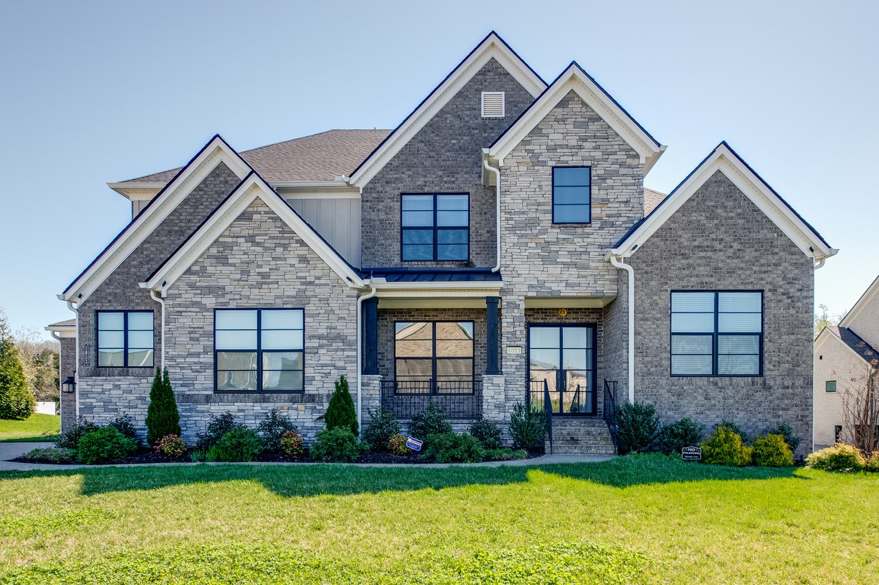 NEW PRICE!  Discover refined living in Nolensville’s coveted Annecy subdivision. Flooded with natural light and designed for modern living, the great room with fireplace flows into an open chef’s kitchen—ideal for everyday family life and entertaining. A bright, well-appointed office by the foyer offers a quiet workspace, while a private first-floor guest suite provides a restful retreat for visitors. The main-floor primary suite overlooks the expansive backyard and features generous closet space, double vanities, and a luxurious separate bath and shower.  Built by Drees and finished with premium touches, the home showcases extensive custom cabinetry and California Closets in multiple bedrooms. Upstairs are three additional bedrooms each with full baths, plus a loft overlooking the living room. A versatile bonus room opens to a covered porch—perfect for morning coffee or small gatherings. The main covered deck includes motorized screens, a fireplace, and a split HVAC unit for year‑round comfort.  Practical conveniences include laundry off the kitchen with extra cabinets, counter space and a dog wash, a front-yard fence with an invisible pet boundary, and a backyard ready for an added patio, pool, or extended fencing toward the wooded common area. Systems and upgrades: Tesla charging outlet, Guardian Systems security, whole‑home blinds, water softener, irrigation, and custom front‑yard lighting. Walk to the Annecy neighborhood pool, minutes from the interstate and Tanger Outlets, all within Williamson County schools and amenities. Move‑in ready—schedule a showing to experience what makes this home special.