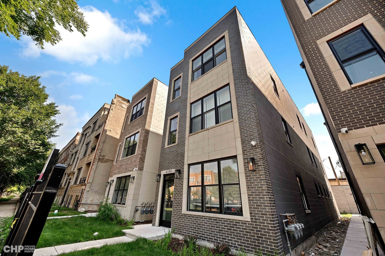 ONE MONTH FREE RENT! Sign a 15-month lease and enjoy your 7th month rent-free. WAIVED MOVE-IN CHARGE FOR APPROVED APPLICATION BY 6/30. Available for immediate move-in, this stunning unit is not just a home - it's a lifestyle upgrade. STYLISH 3 BED/2 BATH MOVE IN NOW! Located in an exclusive, intimate three-flat building in the heart of Bronzeville, this brand-new rental offers modern elegance and thoughtful design. Highlights include: PROFESSIONAL Kitchen: Fully-appointed shaker-style white cabinetry, stainless steel appliances, quartz island with full custom backsplash, and a professional-grade layout. LVT Flooring: Durable, stylish, and perfect for everyday living. BRIGHT & Open Living Spaces: Spacious living room with abundant natural light and a cozy breakfast nook for daily dining. PRIMARY Suite Retreat: Luxurious walk-in closet, spa-like bathroom featuring an oversized glass-enclosed shower, and sleek black metal fixtures for a modern touch. Generously-Sized BEDROOMS: Both guest bedrooms comfortably fit queen-sized beds. ADDITIONAL FEATURES include 3 Car garage parking, High-efficiency furnace and tankless water heater, In-unit washer/dryer, Private rear terrace, GBF smart link intercom system, Secure, professionally managed premises. PET-FRIENDLY: 1 dog (up to 50 lbs) or up to 2 cats (with approval). 250 for dogs, 150 per cat. APPLICATION REQ: Minimum credit score of 680 per adult, Monthly income of at least 3X the rent, 350 move-in + 150 for each additional adult tenant. Agent accompaniment is required for all showings. Don't miss your chance to enjoy modern comfort and convenience. Schedule your tour today!
