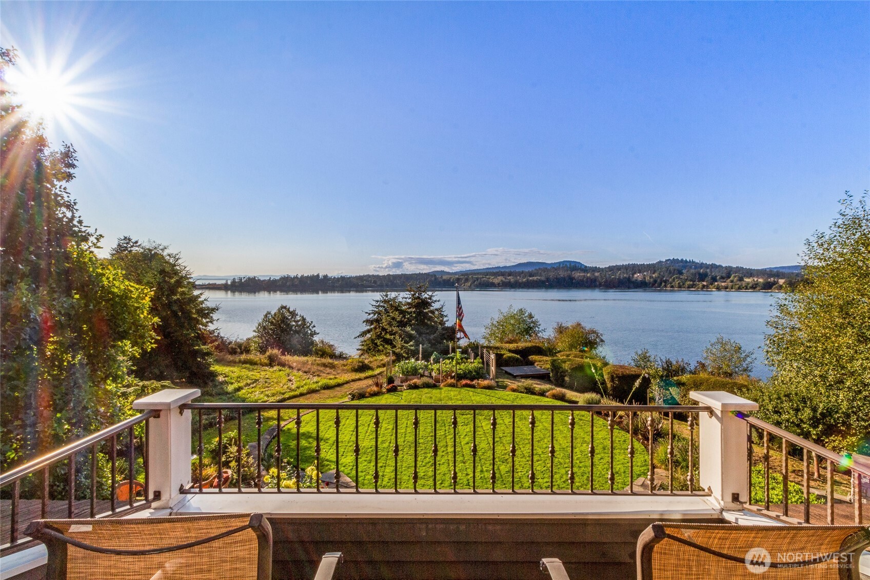 Spectacular sunny West facing waterfront home. Close to town with privacy and space for all. Beautiful views of False Bay, Valley, Strait and Mountains beyond. Special places around every corner indoor and out. Quality 4809 SF home with spacious open floor plan, chefs kitchen, 4 beds, 3.25 baths, primary bedroom with en-suite bath, jetted tub and FP, office w/deck, loft and bonus room. Expansive patios with generous covered area, outdoor kitchen and fireplace, hot tub, garden and greenhouse. 3-car garage with guest area above. 3+ acres with lush trails to 659’ of waterfront on False Bay with stairs to beach and boat shed.Radiant heat, solar power, EV car charger. Hiking trails and beaches nearby including American Camp and Eagle Cove Beach.
