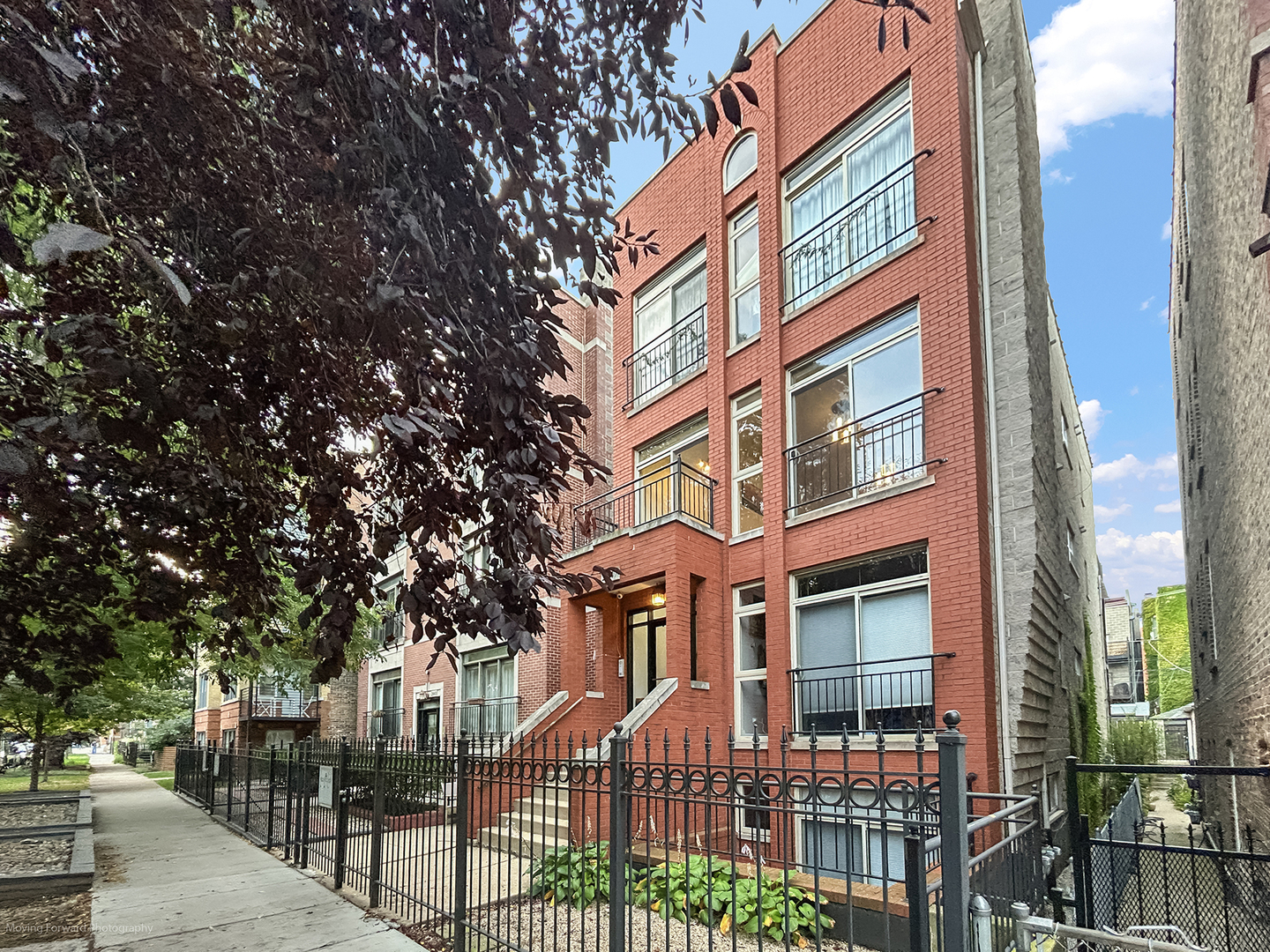 Discover your sanctuary in this beautifully renovated 2-bedroom, 2-bathroom condo located on a serene, tree-lined street in Ukrainian Village. In this cherished West Town/Ukrainian Village neighborhood, you will be just moments away from a variety of dining options, entertainment venues, peaceful parks, and local shops, all contributing to the vibrant community life you deserve.    This home is filled with natural light thanks to oversized windows. It features warm dark flooring throughout, a gourmet kitchen with inviting granite countertops and stainless steel appliances, and maple cabinets that make meal preparation a joy. The thoughtful design includes stylish lighting and a comforting wood-burning fireplace, perfect for cozy evenings.    The master suite serves as a personal retreat, complete with an oversized jacuzzi tub, a separate shower, and a double vanity. Enjoy your outdoor space on the large back deck, which is ready for moments of relaxation and wired for surround sound. Additionally, you'll have the convenience of two parking spaces included.
