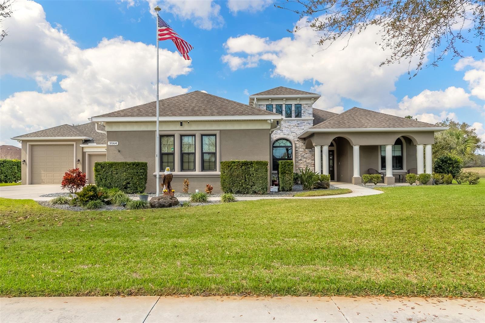 CHECK OUT ALL OF THE GARAGE SPACE!! Bring your boat, RV, trucks, cars and motorcycles! This beautifully maintained 2014 model home has room for them all. This beautiful 3 bedroom + office / 2 bathroom / 6+ car garage can be found in the beautiful golf community of Halifax Plantation. Worry about energy bills no more as the newly added 2022 solar system powers the entire house. There is also a buried 500 gallon propane tank and a 2021 whole house generator just in case if all else fails. There are no worries about losing power in this home. The newly built detached garage is 28'x36' with electric, water, sewer, sink, 220 power, 30 and 50 amp plug ins, and storage in the attic. Such a great space for all of your toys! Inside the home you will love the open floor plan with natural light and 11'6" ceilings. Beautiful dark wood floors can be found throughout the main areas of the home, with carpet in bedrooms 2 and 3, and tile in the bathrooms. The eat-in kitchen has an abundance of cabinets, spacious granite countertops, large island, stainless appliances and new top of the line dishwasher. Beautiful coffered and wood beam detailed ceilings. Huge master bedroom with room for a king size bed and a sofa. Master bathroom has double sinks, gorgeous walk in tiled shower with glass surround, private water closet and a capacious walk-in closet. Enjoy lounging on the 2017 added 44'x24' lanai. Sit in the shade and watch tv or in the sun and watch the golfers on the 15th hole. This home offers a very large lot with added privacy of a 8' surrounding hedge and a preservation to the right side. Enjoy gardening? There are 6 raised beds that are hidden from view to plant your favorite veggies, fruits, or herbs. Enjoy all that Ormond Beach has to offer. This home is a short drive to the beach, Tomoka State Forest and the Old Dixie Hwy Historic Loop. Bring your toys and come and make this home yours! All measurements and information is intended to be accurate but cannot be guaranteed. ;Water: City