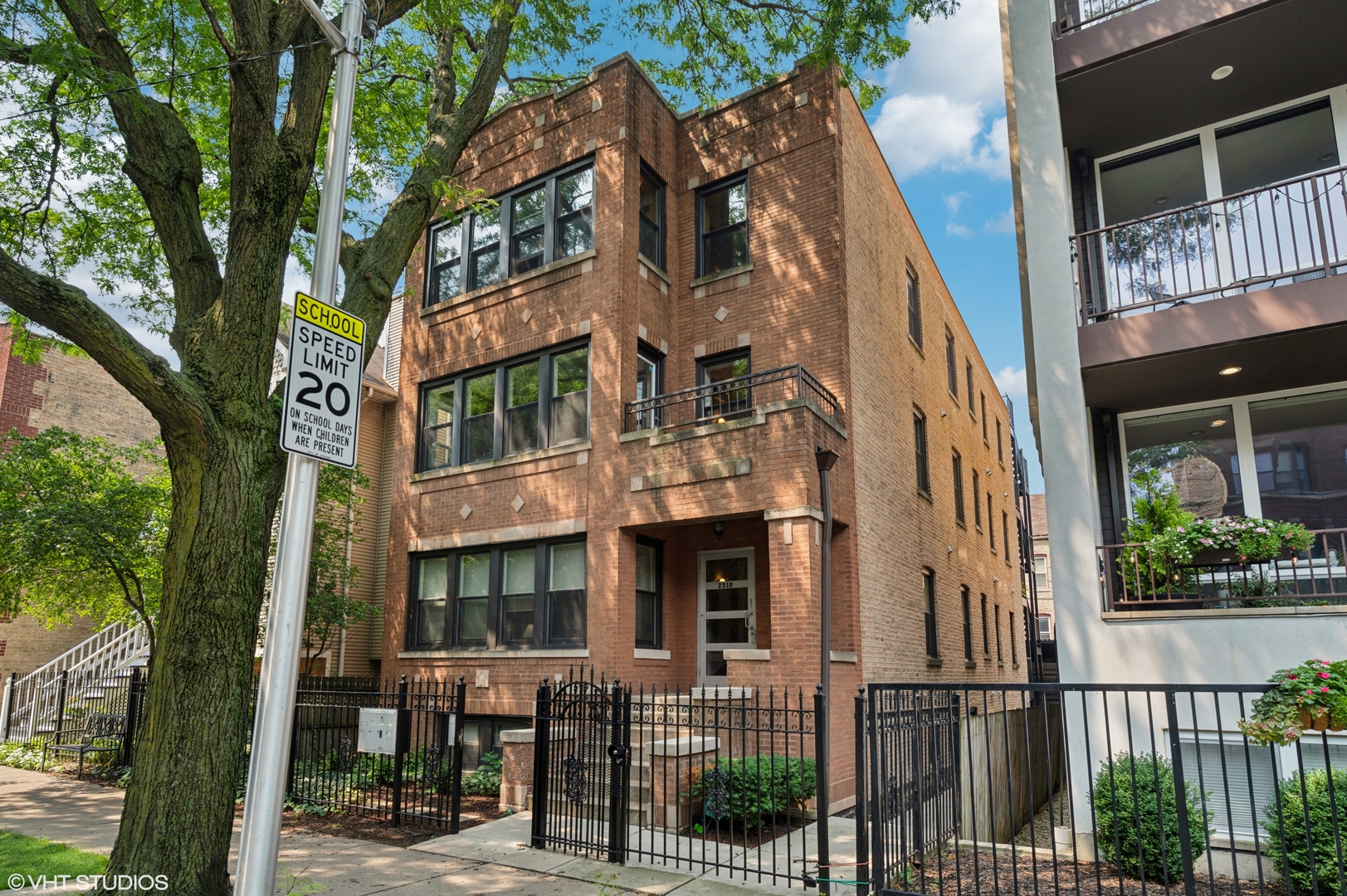 Nestled on a picturesque, tree-lined street in the heart of Bucktown, this wide 2-bedroom, 2-bathroom condo offers a perfect blend of vintage character and modern comfort. Located within a stately brick building, this unit is rich in architectural charm, featuring exposed brick walls and wide-plank espresso-stained oak flooring throughout. The sun-drenched living space and open-concept kitchen are both stylish and functional, and the designated dining nook creates an ideal space for entertaining or everyday meals. The home boasts two generously-sized bedrooms, in-unit laundry, and TWO private outdoor spaces, front and back. 1 garage spot included in the price. Just moments from Holstein Park, the Metra, the Blue Line, and Bucktown's renowned dining, shopping, and nightlife, this home offers the best of urban living in one of Chicago's most sought-after neighborhoods.