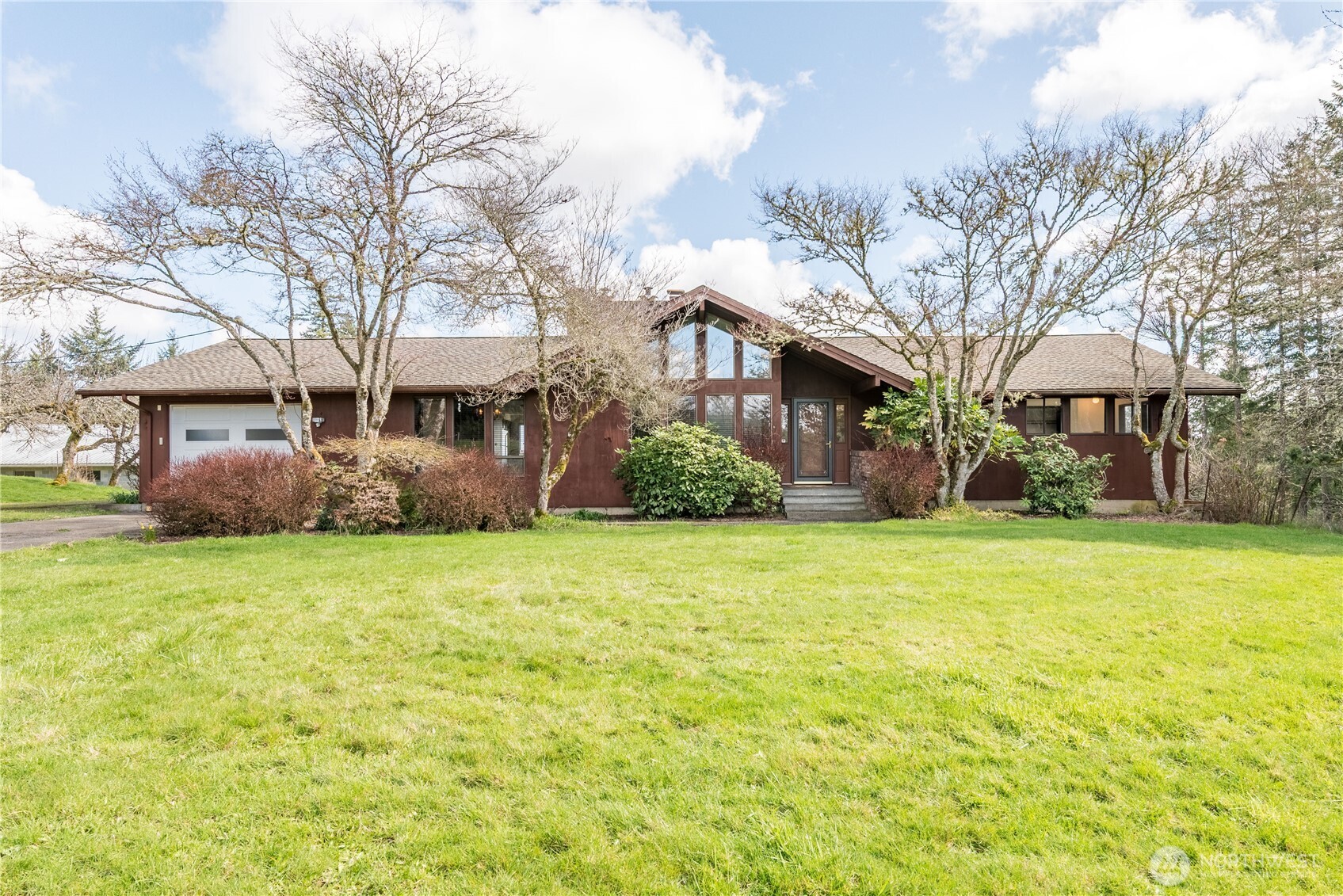 Tranquility awaits you at this Custom Northwest Contemporary home on 25.3 Acres with a captivating view of Mt Rainier! Updated home boasting 2,126 SF finished main level & 1,896 SF unfinished basement, 3 bdrms, 2 bthrms, great room w/vaulted ceiling-brick FP w/insert-wall of view windows, frml living rm w/brick FP & insert, spacious kitchen w/new SS appls-indoor rotisserie-eating bar-pantry, dining rm & family rm w/slider to large deck, utility rm, primary bdrm w/walk-in closet-slider to deck-ensuite/continental bthrm, new LVP flooring and carpeting throughout, heat pump, wood burning furnace & two 1 car garages. The grounds feature a gated entry, Dogwood trees, fenced pastures w/natural pond, 2240 SF carport, 1440 SF Barn 640 SF machine shed, 40x60 pole building, fruit orchards, blueberry bushes, gardens & approximately 18 acres of  forest land with a current timber cruise value of $153,000! Ideal equestrian property or family farm on the desirable Seminary Hill!
