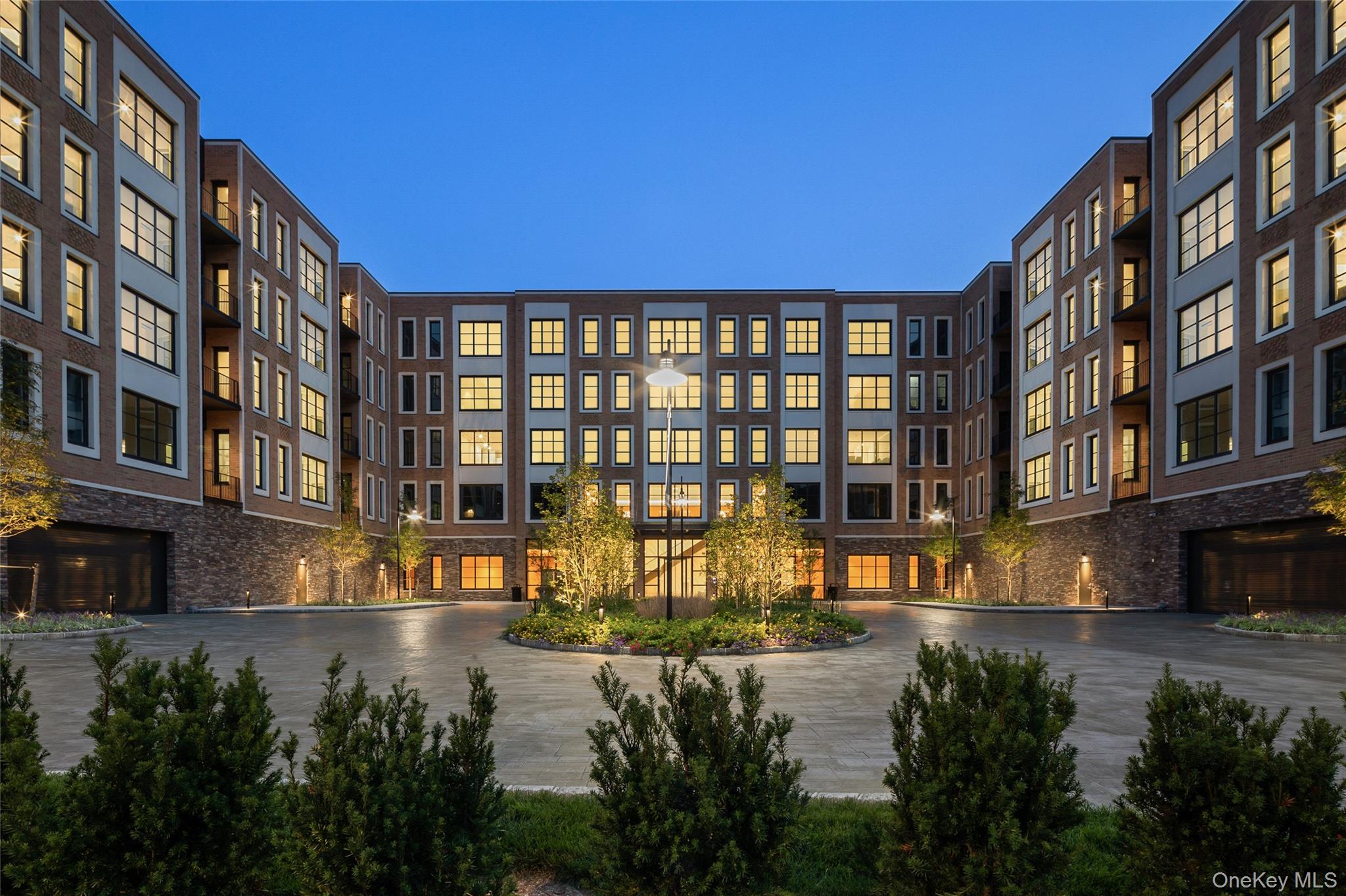 GLEN COVE -This bright two bedroom, two bathroom home features 10' ceilings, and floor to ceiling windows. This layout features an open kitchen with views of the pool and marina. The gourmet kitchen complete with custom paneled GE appliances has white Brazilian quartzite countertops and a kitchen island with a Kohler undermount sink, Insinkerator garbage disposal and instant filtered hot and cold water faucet. A GE Monogram 6 burner gas range is equipped with dual infrared cooking and is fully vented. The white Siena flat paneled cabinets and a Sharp easy touch drawer style microwave complete the space. The spacious primary bedroom features a large closet and an en-suite 4-fixture primary bathroom with white marble floors, countertops and full height porcelain tiled walls, a glass enclosed shower and a double vanity with all Kohler fixtures. The home includes a front loading washer and dryer. The Beacon at Garvies Point is perfectly situated in North Shore's most dynamic new community, set in a 56-acre picturesque waterfront and adjacent to a 62-acre serene nature preserve, within 1 hour of Manhattan. Exclusive residential services & amenities feature a 24-hour concierge, outdoor kitchens, outdoor pool, state-of-the-art fitness center, yoga studio, library, lounge, card room, game room, dining/party room with prep kitchen and a 32 person screening room. Great opportunity for an investor!! Available with tenant in place until November 2026.