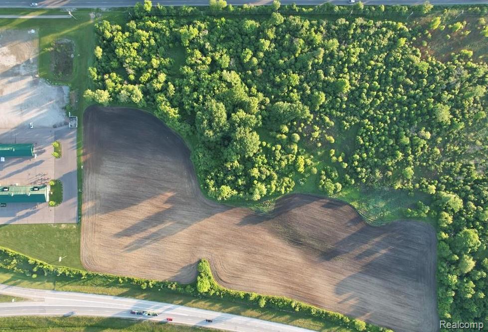 Approx. 25(+/-) acres in the path of growth with potential for multifamily, retail, hotel, storage, condos, or subdivision development. Larger or smaller parcels are available. Boasting approx. 1,500(+/-) feet of I 69 frontage along the sought after Irish Road corridor, this site is surrounded by Meijer, Starbucks, Target, Menards, strong demographics, and high traffic counts. Rare development opportunity in a prime location. Call agent to discuss. Do not miss this one.