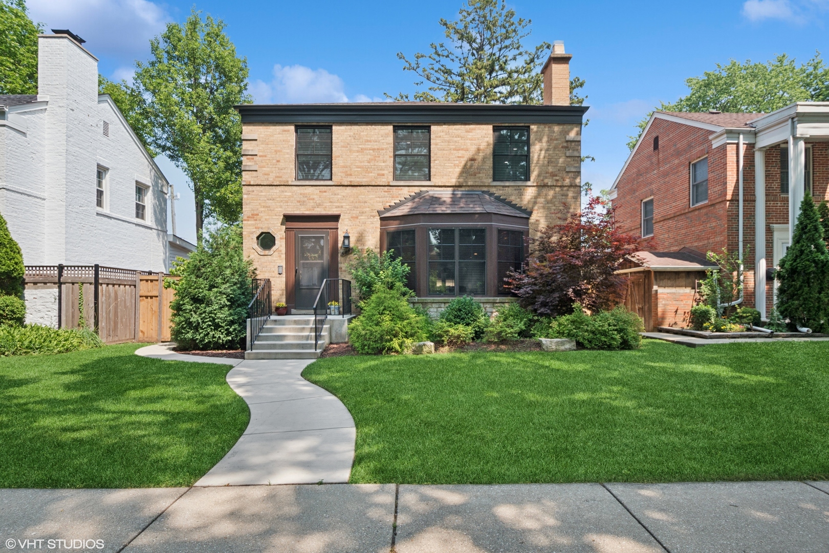 Welcome to this stunning, extra-wide Georgian home nestled in the highly sought-after and picturesque neighborhood of Forest Glen. Thoughtfully renovated to blend timeless elegance with modern comfort, this home is the perfect urban retreat.    Step into a sun-drenched living space featuring gleaming hardwood floors and a classic wood-burning fireplace, ideal for cozy Chicago evenings. The spacious layout includes a formal dining area, a beautifully updated chef's kitchen with contemporary finishes, and ample room for entertaining.    Upstairs, you'll find three generously sized bedrooms and two full baths, including a luxurious primary suite. The 2.5 bathrooms have been tastefully updated.    Outside, enjoy professional landscaping that enhances curb appeal and provides the perfect backdrop for outdoor living. A private backyard with a new large Trex deck offers space for relaxation, play, or entertaining.    Located on a quiet, tree-lined street in Forest Glen, this home is part of a welcoming community known for its natural beauty, top-rated schools, and easy access to the Metra, forest preserves, and major highways.    Don't miss this rare opportunity to own a turnkey home in one of Chicago's most charming and tranquil neighborhoods.