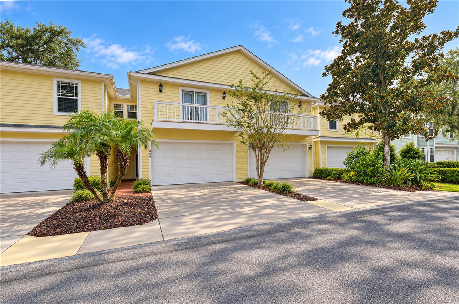Discover the charm of Lumsden Reserve, a beautiful gated townhome community offering low-maintenance living, mature landscaping, and a peaceful setting in the heart of Brandon! This spacious 3-bedroom, 2.5-bath townhome offers over 2,300 square feet of living space, a thoughtfully designed floor plan, and plenty of room to spread out. Lovingly maintained by its original owners, this home welcomes you with a charming brick-paved covered front porch and inviting entryway. Major updates have already been completed, including a NEW ROOF in 2022, NEW A/C in 2023, a water heater replaced in 2020, and beautiful luxury vinyl flooring installed throughout the main level in 2024! Additional improvements include updated light fixtures, ceiling fans, and faucets, adding a fresh, modern touch throughout the home. Step inside to find the beautiful luxury vinyl flooring, crown molding, and an inviting layout designed for both everyday comfort and entertaining. The kitchen features 42-inch cabinetry, ample counter space, and stainless appliances, with a separate dining room nearby showcasing classic chair rail detailing. The spacious living room offers plenty of room to gather, with French doors opening to a private patio and fenced backyard, creating a wonderful extension of the indoor living space! Upstairs, the generously sized primary suite offers a peaceful retreat with French doors leading to a private balcony, an oversized walk-in closet, and an en-suite bath featuring dual sinks, a garden soaking tub, and a separate walk-in shower. Two additional bedrooms are comfortably sized and feature impressive closet space, while a full bathroom and conveniently located upstairs laundry room complete the second floor. Additional highlights include storage beneath the staircase and the convenience of having all three bedrooms and the laundry room upstairs. Enjoy the beauty of Lumsden Reserve, from its brick-paved gated entrance to its established trees and beautifully landscaped surroundings. Conveniently located near shopping, dining, schools, and major roadways, this home offers a wonderful combination of space, thoughtful updates, and low-maintenance living in a desirable Brandon location!