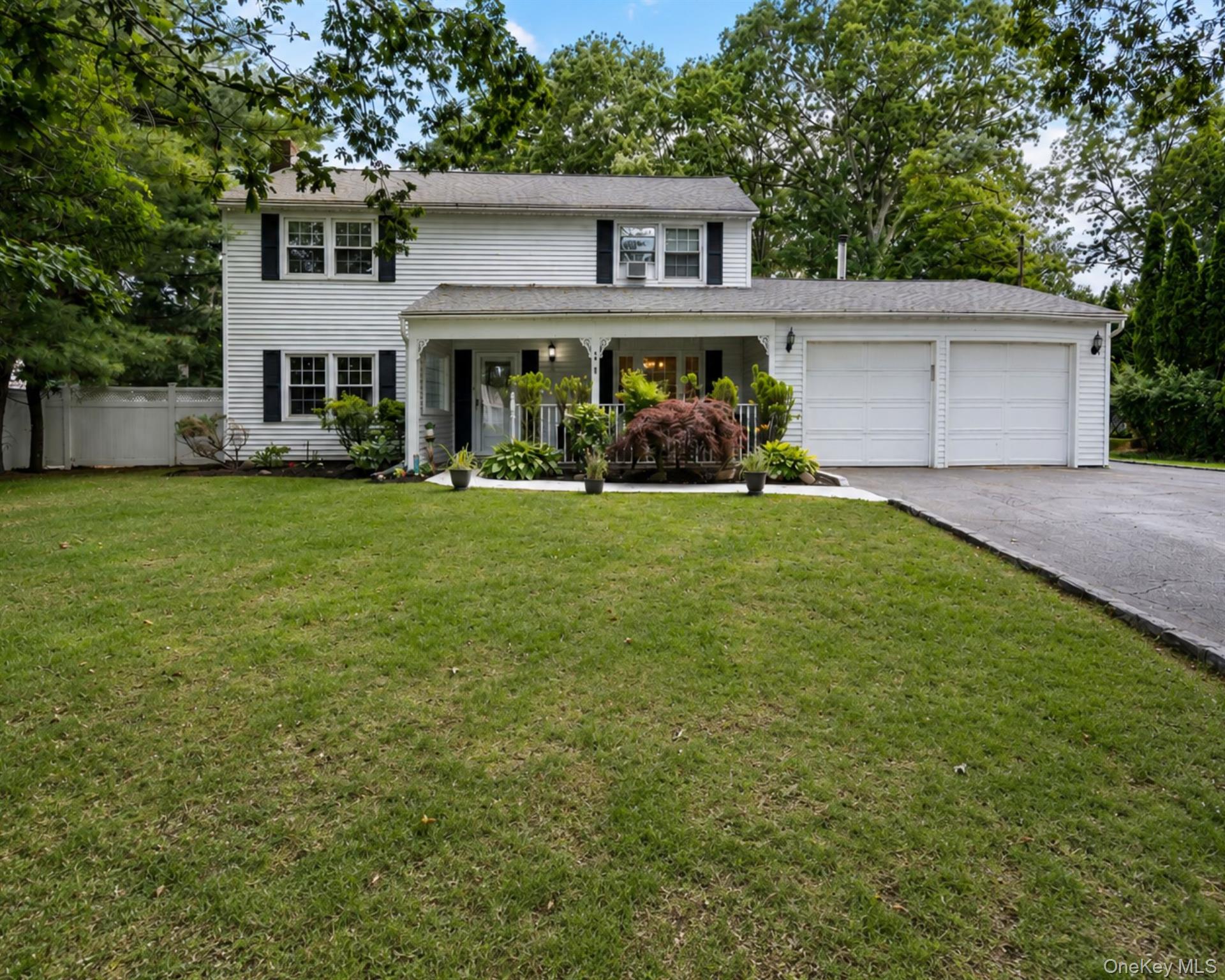 Welcome to this well maintained 3-bedroom, 2.5-bath Colonial located in the desirable S Section of Stony Brook, part of the established Strathmore community. Offering generously sized bedrooms and a functional layout, this home features a spacious eat-in kitchen, formal dining room, living room with a wood burning fireplace, a bonus room off the laundry area that provides flexible living space, and a 2-car garage. Step outside to a private backyard featuring an in ground swimming pool, creating the perfect space for relaxing, entertaining, and enjoying the summer months.Located within the highly acclaimed Three Village School District, this home is just minutes from Stony Brook University, Stony Brook Village, shopping, dining, parks, beaches, and major commuter routes. If you're looking for a spacious Colonial in the Strathmore community of Stony Brook, this is an opportunity you won't want to miss.
