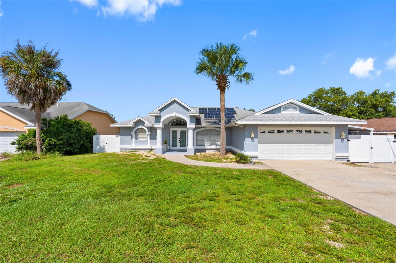 MOTIVATED SELLER! Don’t miss this inviting 3-bedroom, 2-bathroom home with a 2-car garage, offering a great combination of comfort, functionality, and Florida living. High ceilings enhance the open and spacious feel of home, while the private in-ground pool, perfect for relaxing, entertaining, and enjoying sunny Florida days. The home also features solar panels and a spacious layout with plenty of potential to make it your own. Conveniently located near shopping, dining, medical facilities, and major roadways. Schedule your private showing today and come see everything this home has to show!