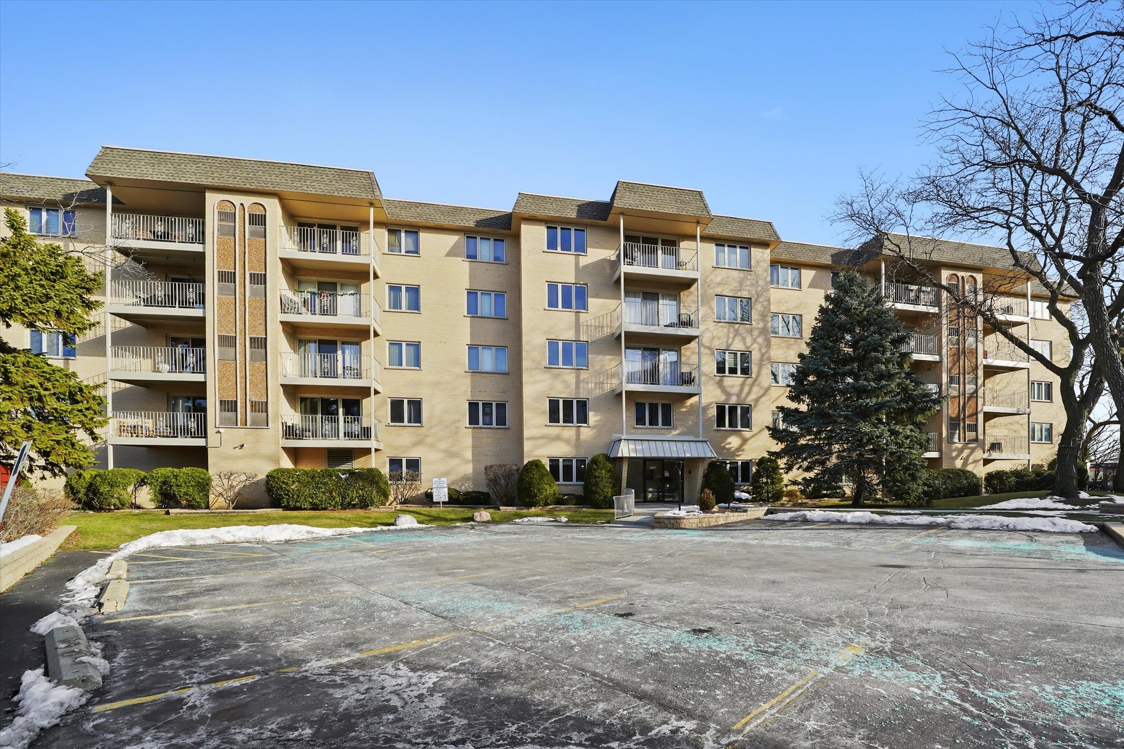 Welcome to beautiful downtown Des Plaines! This spacious 2-bedroom, 2-bathroom condo features an open-concept layout filled with natural sunlight. The primary bedroom offers a private ensuite full bath and a walk-in closet. Hardwood floors, ceramic tile, and carpet are thoughtfully incorporated throughout the unit. Enjoy relaxing or entertaining on the 12-foot balcony. Unit has ample storage throughout.  The building is exceptionally clean and features an elevator for added convenience. The unit includes an indoor heated garage parking space and a private storage unit, along with plenty of guest parking available. Located in an incredible area close to parks, entertainment, restaurants, highways, and public transportation. This move-in-ready unit is a must-see!