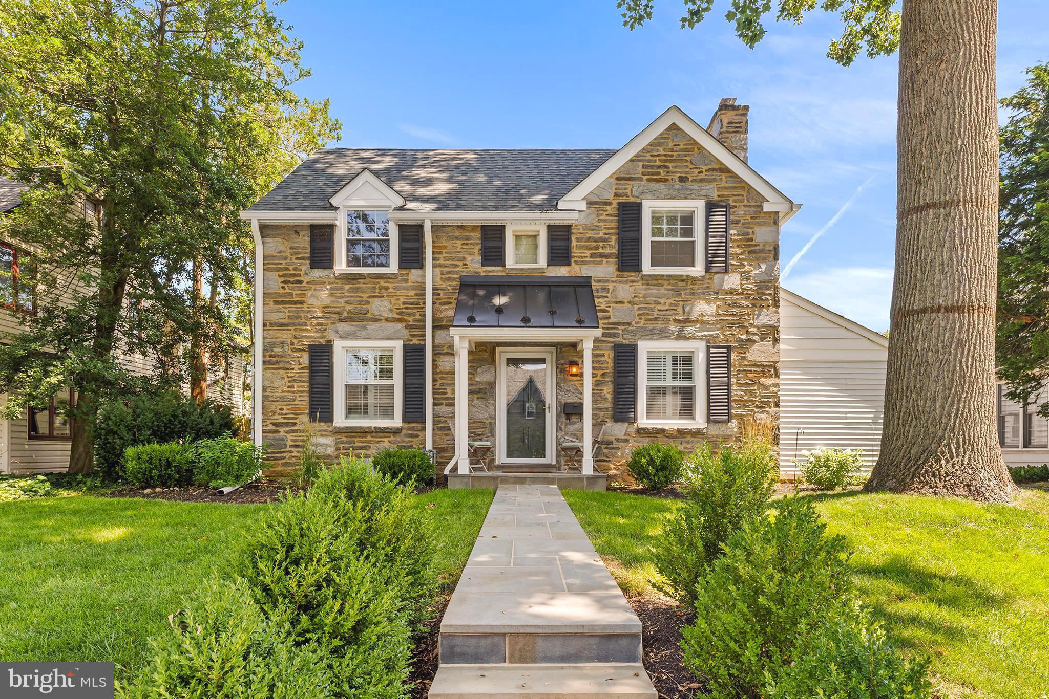 Welcome to 143 Trent Road, a beautifully updated stone Colonial tucked along a tree-lined street with sidewalks in the Penn Wynne section of Wynnewood. From the moment you approach along the bluestone path, the charm is immediate. The stone exterior, new portico, shutters and beautifully refreshed landscaping give this home the kind of classic Lower Merion curb appeal people love.Step inside to a bright, open center-hall floor plan designed for easy everyday living and entertaining. The spacious family room features beautiful hardwood floors, deep-set windows with plantation shutters and wonderful natural light. Just off the family room, a convenient mudroom offers additional storage, hooks and direct access to the driveway.Flow seamlessly into the expansive dining room, where oversized windows allow light to pour in and create the perfect setting for everything from weeknight dinners to larger gatherings. From here, continue into the renovated kitchen, where a generous island anchors the space alongside a 36-inch range with an extra-capacity hood, 36-inch sink, abundant cabinetry and storage, new flooring, a dedicated coffee bar and custom built-ins. Large sliding doors open directly to the backyard, extending the living space outdoors to a flat, fenced-in yard with a patio, updated rear siding and plenty of room to relax, dine and entertain.Just off the kitchen, a separate office and powder room complete the first floor. Upstairs, the primary suite includes its own full bathroom along with access to a large finished attic space, offering even more flexibility for a dressing room, sitting area, yoga space or additional storage. Three additional bedrooms—including a fourth bedroom added by the current owners—and a full hall bathroom complete the second floor.The finished lower level adds yet another layer of usable living space, with plenty of room for a playroom, media room or additional lounge area, along with a laundry area featuring a new washer and dryer installed in 2026 and additional storage.And then there is the location. Set in the heart of Penn Wynne, 143 Trent Road offers the charm of an established neighborhood with tree-lined streets and sidewalks, along with easy access to everything that makes Lower Merion living so desirable. Parks, recreation, shopping and dining are all close by, along with the Cynwyd Heritage Trail and nearby Ardmore. SEPTA Regional Rail and Amtrak service from Ardmore Station also make trips into Philadelphia, New York and along the Northeast Corridor incredibly convenient.Beautifully updated, incredibly versatile and ideally situated in one of Wynnewood's most established neighborhoods, 143 Trent Road offers the kind of space, setting and lifestyle that are easy to love, and difficult to replicate!