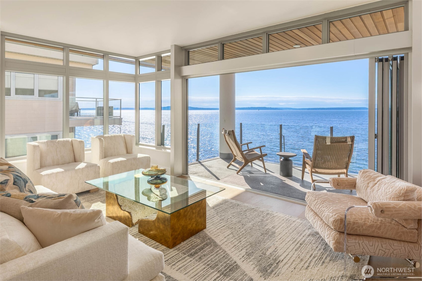 Discover the Westerly Penthouse, a coastal retreat perched above Alki Beach & crowning the award-winning Infinity Shore Club. This stunning three-bedroom + den condominium-estate offers 3,262 SF of exclusive living space (2,186 int. + 1,076 ext.). Sweeping panoramas showcase Puget Sound and the Olympic Mountains in breathtaking display. The Westerly Penthouse exudes beauty & functionality at every turn, from airy light-filled interiors by Susan Marinello, to bespoke bedroom suites, to a Miele chef’s kitchen. Unique to the penthouse is a private rooftop deck, directly accessible for hosting unforgettable gatherings & savoring tranquil sunsets. Now available, a rare opportunity to own the crown jewel on Seattle’s iconic beachfront.