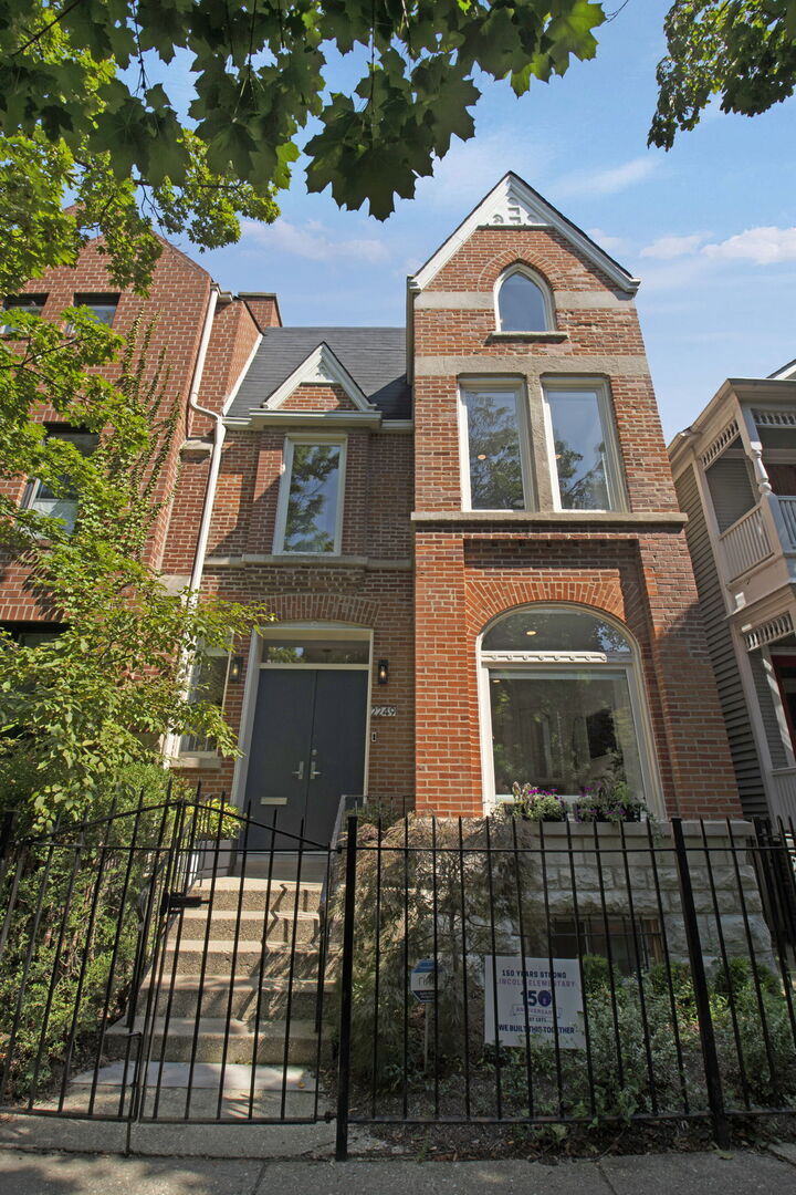Welcome to this beautifully updated 4-bedroom, 4 full & 2 half bathroom rowhome, perfectly situated on a tree-lined street in the heart of Lincoln Park & within coveted Lincoln Elementary School district. With high ceilings, abundant natural light, & a thoughtful layout, this move-in ready residence offers the perfect blend of timeless elegance and modern convenience.  Step inside the main living level to find the updated chef's kitchen featuring quartz counters, breakfast bar, high-end appliances & pantry, which opens up to dining space & beautiful living room with marble fireplace. Renovated mudroom area with custom built-ins & powder room.  Conveniently located right off of main living level is your private outdoor oasis.  The second level features a lovely open family room with bay window & brand new powder room. The luxurious primary suite boasts a newly renovated spa-like bathroom with gorgeous marble & travertine finishes, heated floors & a generous custom walk-in closet. Continue through to the third floor where you will find three bedrooms & two full bathrooms, one bedroom with en-suite bathroom. Spacious front bedroom with charming alcove & impressive closet space.  The newly finished basement features a flex space and/or gym area, gorgeous full bathroom & designated laundry area with built-in storage, utility sink & quartz counter. Attached 1-car garage add convenience to your daily routine.  Additional features include hardwood floors, new carpet, 2 new hvac (2022), recent roof updates & tuck-pointing, & ample storage throughout.  This home offers a rare combination of luxury, comfort, & an unbeatable location-just steps from Oz Park & Lincoln Park, dining & shopping.