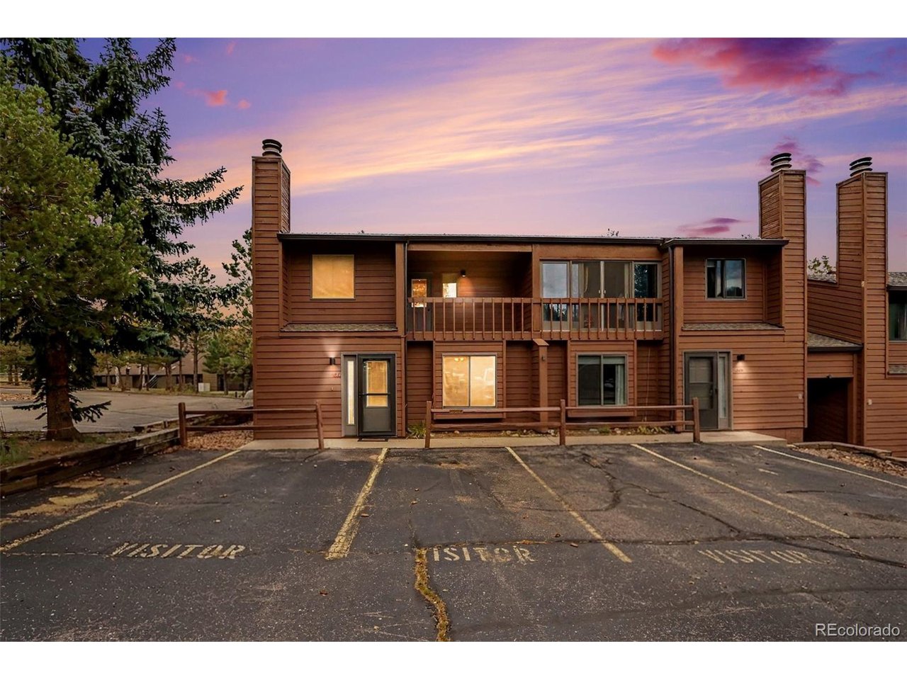 Experience the ultimate in Colorado mountain living with this beautifully updated, 2-bedroom, 2-bathroom end-unit condo in the highly desirable Eagle View community of Estes Park. Spanning 1,056 square feet of effortless, light-filled living space, this premium end unit offers unparalleled privacy and the rare convenience of parking on both sides of the home. Step inside to find a warm, welcoming main level featuring newer laminate and tile flooring, a cozy wood-burning fireplace, and a spacious kitchen beautifully upgraded with sleek granite countertops and newer black appliances-including a premium Bosch dishwasher.mmUpstairs, the comfort continues with beautifully updated custom bathroom vanities and pristine modern shower. Unwind on your private upstairs balcony, where you can sip morning coffee while soaking in beautiful mountain views. Situated in a peaceful neighborhood where elk frequently wander through the well-maintained community grounds, you are just steps from hiking and biking trails, minutes from downtown shopping and dining, and a quick drive to Lake Estes and Rocky Mountain National Park. Perfect as a full-time residence, weekend getaway, or future investment in an always-strong market, this turnkey property delivers low-maintenance living in a spectacular mountain setting.