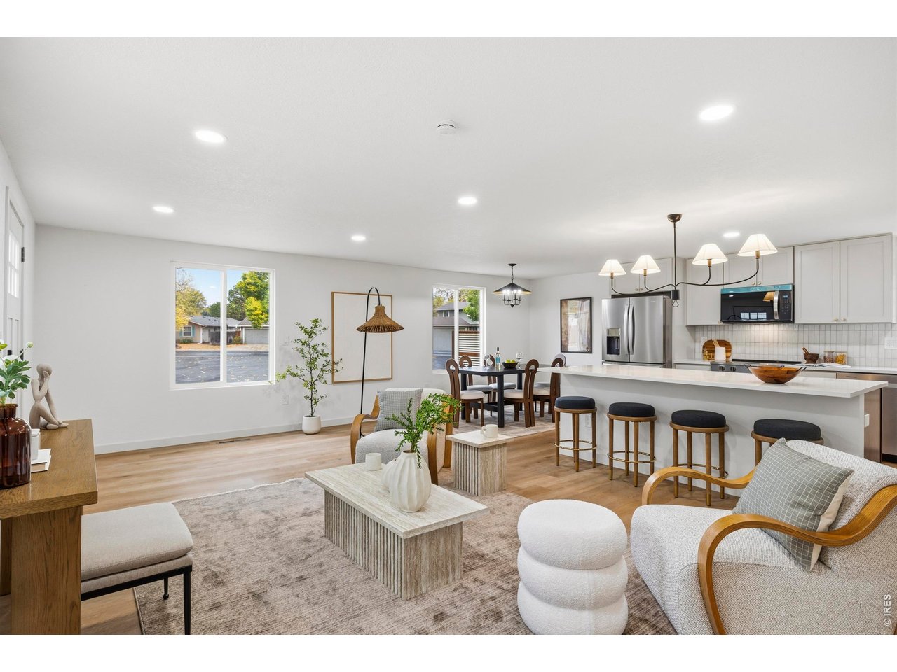 Go ahead-fall a little in love. With newly painted exterior, refreshed landscaping, and a cul-de-sac setting, this remodeled west Fort Collins home gives quick access to CSU, trails, & Horsetooth Reservoir. Inside, sunshine pours through new windows, and multiple living spaces invite you to find your favorite sunny spot. Flexible floorplan has dedicated dining area, living room, family room & the study flexes as a playroom, craft area or light & bright yoga studio. The kitchen might steal your heart, brand new cabinets, stainless steel appliances, dreamy quartz countertops, and a large island made for coffee dates, impromptu appetizers, and conversations that linger. Upstairs, there's more to love: all five of the bedrooms plus three and a half blissfully updated bathrooms. Pause in these cheerful spaces. Don't miss the chic tile accents, fresh lighting & fixtures. Note, when it's time to brush teeth, there's plenty of room for everyone. The primary suite deserves a closer look, with double vanities, a spacious shower, and a walk-in closet with its own sunny window. Outside, gather in the courtyard or BBQ in the parklike backyard. Detached two car garage plus off street RV parking leaves room for your next adventure. No HOA. No Metro District. Reimagined in 2026 with new interior trim, doors, texture & paint, new lvp flooring, new carpet, updated light and plumbing fixtures, and a brand new roof. This home is fresh, finished, and move-in ready. Somewhere between the sunshine & the feeling of this home, you just might fall in love.