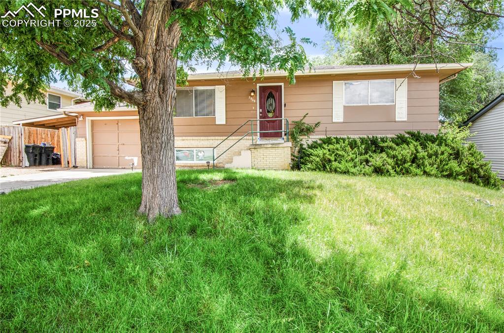Welcome to 2909 Delmar Circle—a refreshed and inviting ranch-style home nestled in the heart of Colorado Springs. This 4-bedroom, 2-bath residence offers a blend of timeless character and modern updates. Inside, you'll find beautifully refinished original hardwood floors, brand-new carpeting, and fresh interior paint throughout, creating a warm and move-in ready atmosphere. The layout features a spacious living area that flows into a functional kitchen and dining space, ideal for everyday living or entertaining guests. Wake up to inspiring views of Pikes Peak from the primary bedroom window, adding a touch of Colorado beauty to your daily routine.

Step outside to enjoy a fully fenced backyard, perfect for outdoor gatherings, gardening, or pets. The single-stall attached garage provides added convenience and storage. Located just minutes from local parks and walking trails, this home also offers easy access to shopping, dining, and major commuter routes. I-25 and Fort Carson are both within close reach, making it an ideal choice for a variety of lifestyles. This property combines comfort, location, and thoughtful updates, all in a desirable Colorado Springs neighborhood.