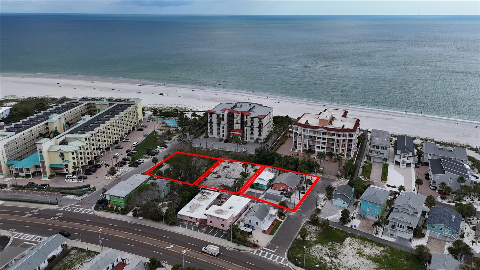 Incredible investment opportunity just steps from the sandy shores of Treasure Island! This unique commercial package includes three adjoining parcels offering exceptional development potential. The lots are situated on almost 1 acre of land in the Resort Facility High (50 units per acre) zoning of Treasure Island, perfectly positioned for a new business or resort venture. Whether you envision creating a boutique beachside resort, building out a high-demand short-term rental portfolio, or combining commercial and residential elements into a versatile income-producing property, the possibilities here are endless. Prime location on the beach, close to shopping, dining, and entertainment, .5 of a mile to John's Pass—don’t miss your chance to develop or invest in one of Treasure Island’s most sought-after areas.