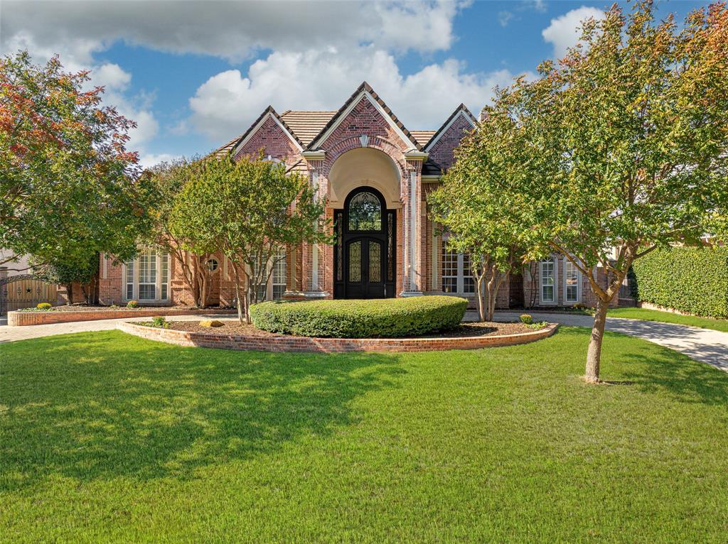 Welcome to a home where classic elegance meets modern luxury in one unforgettable Colleyville address—just 20 minutes from DFW Airport. From the moment you step into the grand foyer, soaring ceilings and ornate iron doors introduce the exquisite millwork that flows throughout this stunning home. Boasting impressive square footage and thoughtful, high-end finishes, this residence is designed for both comfort and entertaining. The butler’s pantry is flanked by a formal dining room and a beautifully refreshed kitchen, with a newly installed Jenn-Air downdraft cooktop, microwave, and dishwasher, complemented by a double oven and abundant cabinetry. The kitchen opens to the breakfast area with serene pool views through expansive windows, and flows seamlessly into the living spaces, each inviting you to relax by one of the home’s five fireplaces. With six bedrooms, including four with ensuite baths, there’s room for everyone to unwind in comfort. The primary suite is a true sanctuary, complete with a fireplace, spacious sitting area, and tranquil views that offer the ultimate escape. Downstairs, an additional bedroom suite with a private bath provides a perfect retreat for guests or multigenerational living. Upstairs, an oversized bonus room delivers incredible versatility—ideal for media, games, or entertaining—and features its own fireplace, a wet bar, and access to the upstairs patio, making it the ultimate hangout space. Storage is abundant throughout, from multiple built-ins to extra closets and a 4-car garage with additional storage, keeping every space organized and elegant. For work or quiet moments, the richly appointed study provides a serene retreat. Step outside and enjoy your private backyard oasis with a sparkling pool, covered patio, and outdoor kitchen, perfect for hosting unforgettable gatherings. 4600 Westbury Lane isn’t just a home—it’s a lifestyle, offering luxury, warmth, and timeless appeal in one of Colleyville’s most coveted neighborhoods.