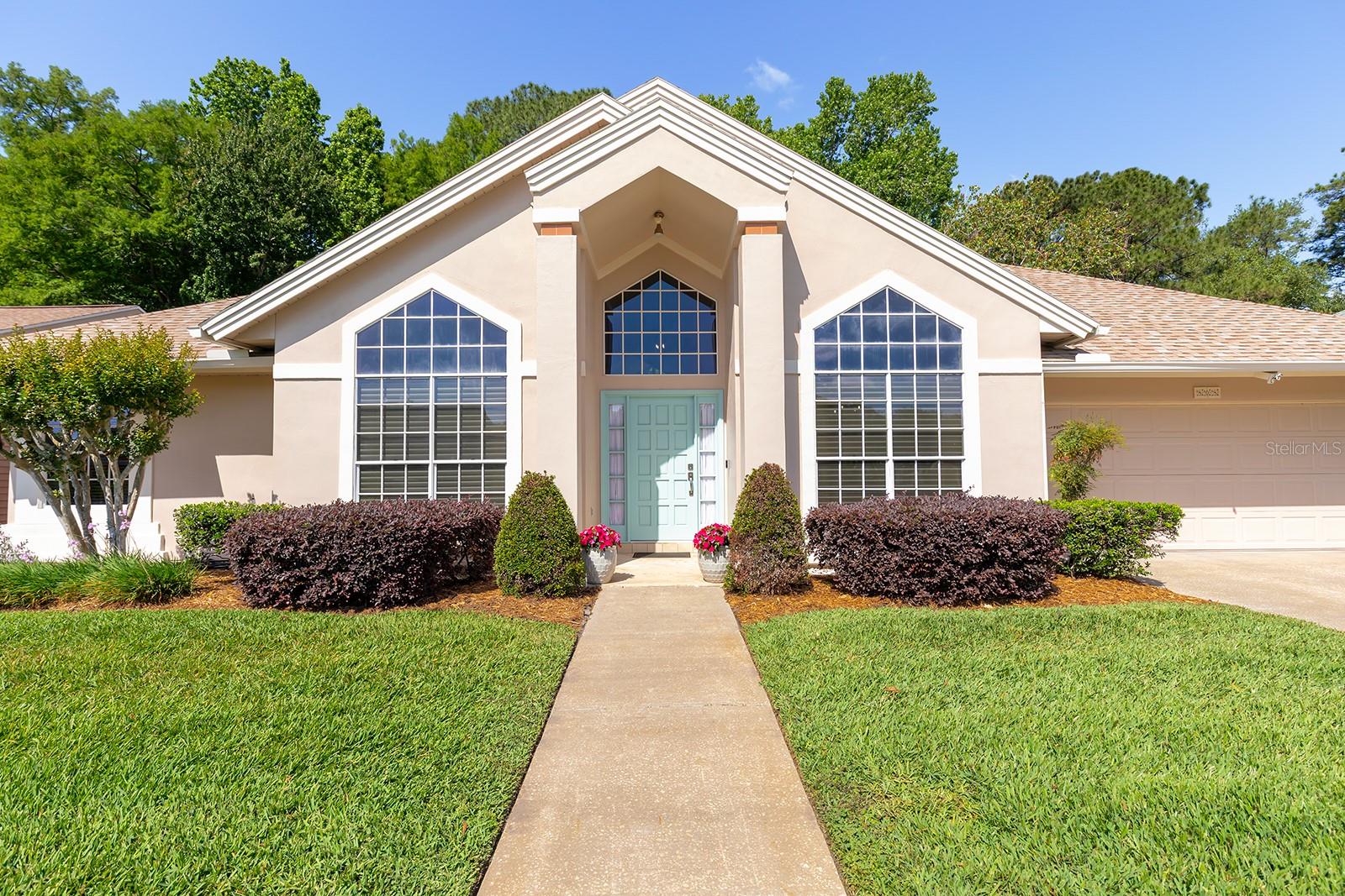 Homes like this in Lake Mary don’t come up often, especially within a boutique neighborhood where quiet streets, mature trees, and a true sense of pride of ownership define the setting. Welcome to 808 Silverwood Drive, a beautifully maintained 4 bedroom, 2 bath residence that reflects a thoughtful balance of timeless design, quality craftsmanship, and meaningful updates throughout.From the moment you enter, soaring vaulted ceilings and abundant natural light create an open, inviting atmosphere, drawing your eye through the home to the professionally enclosed, air conditioned Florida room and the lush wooded backdrop beyond.At the heart of the home, the remodeled kitchen showcases classic, enduring finishes designed to stand the test of time. Rich raised panel 42 inch wood cabinetry with crown molding is complemented by granite countertops, a tile backsplash, under cabinet lighting, stainless steel appliances, a deep skillet friendly sink, and a generously sized pantry with wood shelving. This is a kitchen that blends beauty with everyday function, offering both warmth and long lasting appeal.The thoughtfully designed split floor plan provides comfort and flexibility for both daily living and entertaining. The main living area is anchored by a wood burning fireplace, adding character and a sense of home, while the spacious laundry room offers additional storage and convenience.The primary suite is generously sized and features a striking mitered glass bay window, filling the room with natural light and showcasing views of the vibrant, well maintained backyard. French doors, a walk in closet, and a well appointed bath with dual sinks, a garden tub, and a separate marble shower enclosure complete this private retreat.Step outside to a meticulously cared for outdoor setting where tropical plantings, colorful flowering gardens, and a private wooded backdrop create a peaceful escape. With no rear neighbors and ample space, the backyard also offers the opportunity to design and add a future pool if desired.Beyond its aesthetic appeal, this home reflects a level of care that extends well beyond the surface. Significant updates include a new roof, gutters, downspouts, and exterior paint in 2021, a full home replumb, HVAC system, and hot water heater in 2019, along with more recent improvements such as a 2025 dishwasher and 2020 microwave. Additional features include a Ring Doorbell and Nest Thermostat. These investments provide both confidence and long term value for the next owner.Ideally located in the heart of Lake Mary, you are just minutes from highly regarded Seminole County schools, shopping, dining, and convenient access to I-4 and SR 417.This is the kind of home buyers wait for, where quality, care, and timeless updates come together in a setting that feels both private and connected. But don't wait, hurry come see!