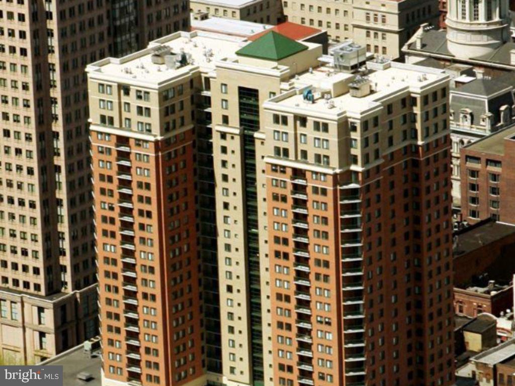 Discover luxury living in this fully renovated 2-bedroom, 2-bathroom condo located in the heart of Baltimore Harbor. This upscale residence features beautiful hardwood floors throughout main area, a modern kitchen equipped with stainless steel appliances, and upgraded bathrooms. Enjoy the convenience of a separate dining area and an in-unit washer and dryer. Relax on your private balcony off the spacious living room. Both bedrooms offer ample storage with built-in closet shelves, while the primary bedroom boasts an ensuite bathroom and a walk-in closet. The building amenities are second to none, including a state-of-the-art gym, concierge services, and a stunning rooftop pool. Secure parking is available in the on-site garage. Don't miss the opportunity to call this luxurious condo your new home!All balconies in the building are being repaired by the management company. As such, the balcony is closed until the repair is completed. Please do not go out onto the balcony during tours. Thank you!