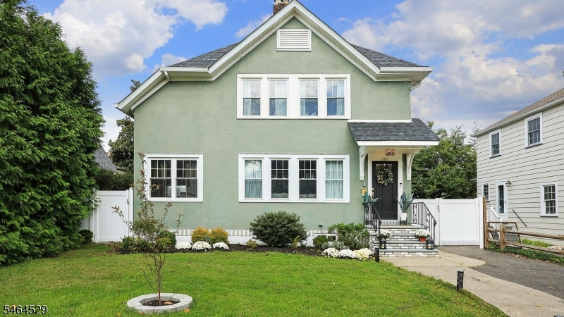Welcome to 702 Springfield Avenue, a beautifully updated Colonial blending classic Cranford charm with thoughtful modern improvements and an abundance of living space. The inviting first floor features a spacious living room with fireplace, formal dining room and eat-in kitchen with center island and separate dining area, and a lovely sunroom/den/office. A comfortable family room, currently used as a formal dining room, offers wonderful flexibility, while a convenient mud/laundry room and powder room complete the level. Upstairs are four bedrooms and two full baths, including a spacious primary suite with walk-in closet, private bath and balcony overlooking the backyard. The newly finished basement, completed in September 2026, provides even more space for recreation, entertaining or a home office. Significant improvements include a new roof, furnace, HVAC units, water heater and appliances in 2023, along with additional kitchen cabinetry; a new fence and remodeled deck in 2024; and remodeled stairs and fresh interior paint in 2026. Outside, the deck and fenced backyard provide a wonderful setting for dining, entertaining or simply relaxing. There is a detached garage too! Ideally situated near Nomahegan Park, schools and vibrant downtown with its restaurants, shops and NYC transportation. An added benefit, the property does not require flood insurance, making this beautifully maintained and extensively updated home an exceptional opportunity in a terrific Cranford location.