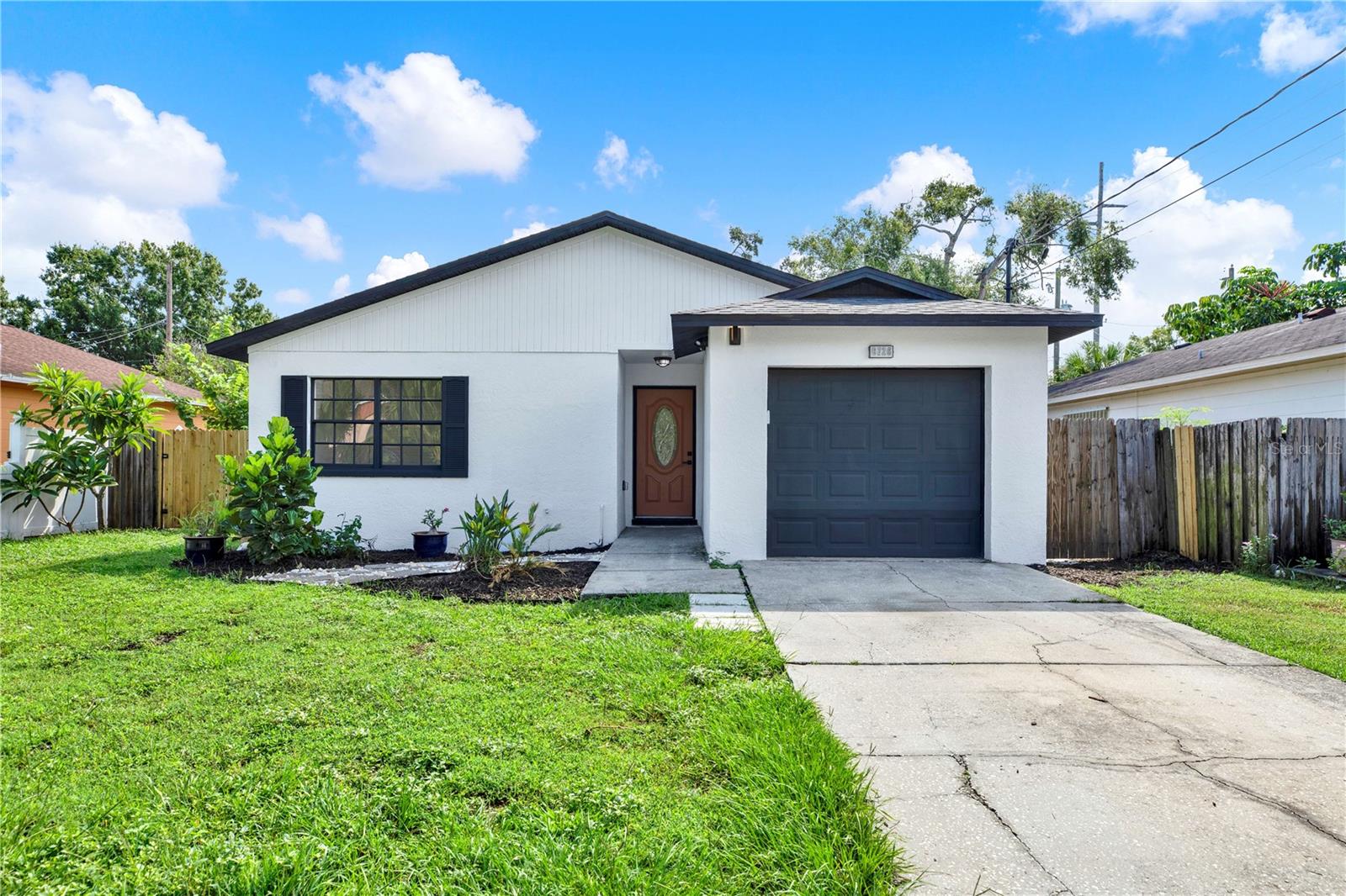 Welcome to this fully upgraded, move-in ready home! This beautifully renovated property features luxury vinyl plank flooring throughout, hurricane-impact windows, a brand-new roof (2025), new HVAC system(2025), new water heater, and new stainless steel appliances. The modern, open-concept kitchen is a showstopper with sleek cabinetry and quartz-style Carrara stone countertops — perfect for cooking and entertaining. The home also features a one-car attached garage with a brand-new garage door opener system.

Enjoy peace of mind knowing this home has never flooded. Step outside to a spacious, fully screened-in patio ideal for relaxing or hosting guests. Located just minutes from Gadsden Park, which offers scenic walking trails and a dog park.

With no HOA or CDD fees, this property is conveniently located near Raymond James Stadium, Midtown, Tampa International Airport, and some of Tampa’s best shopping and dining destinations.

A rare turnkey opportunity in South Tampa — schedule your showing today!